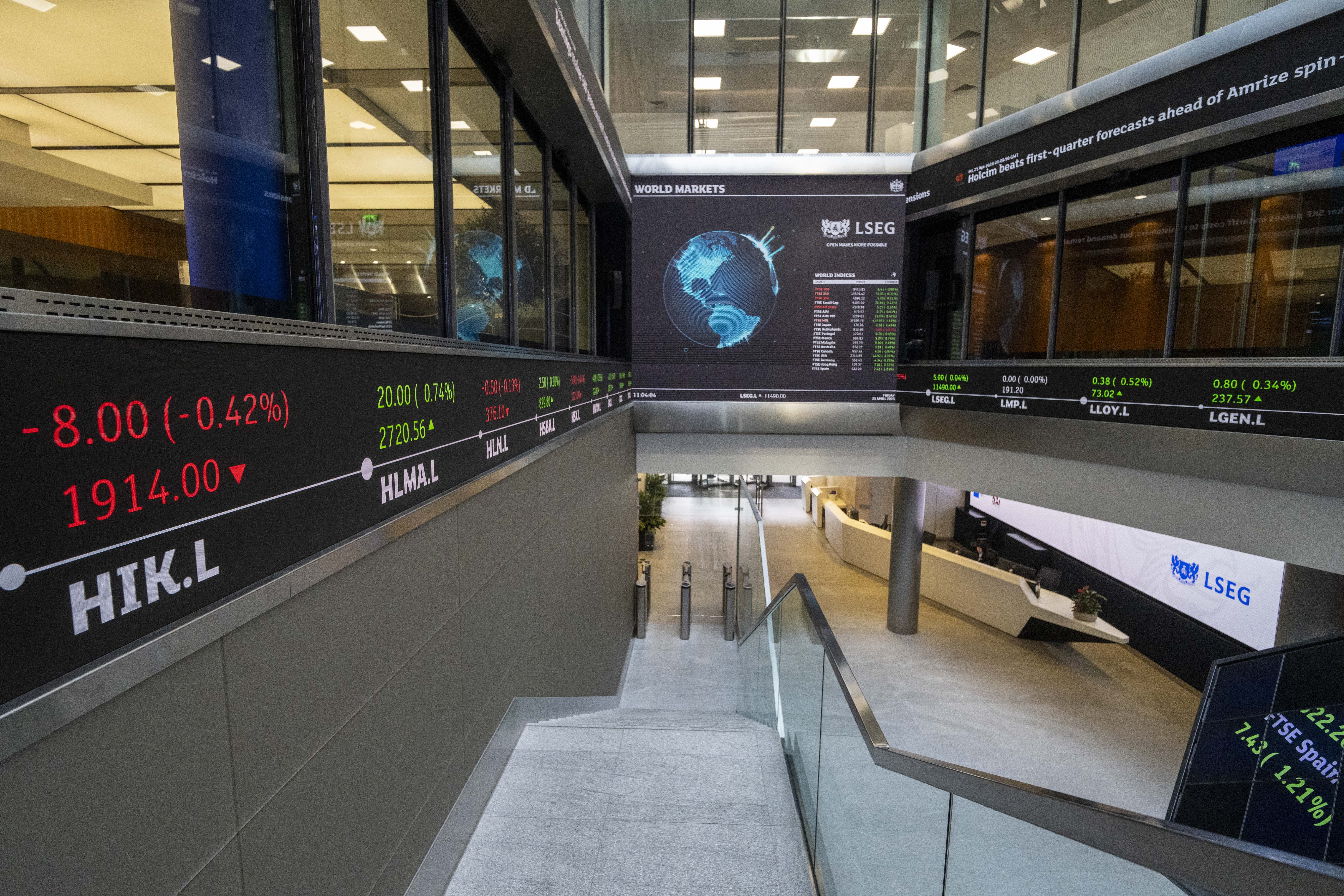 The FTSE 100 index closed up 14.27 points, 0.2%, at 8,801.29 (PA)