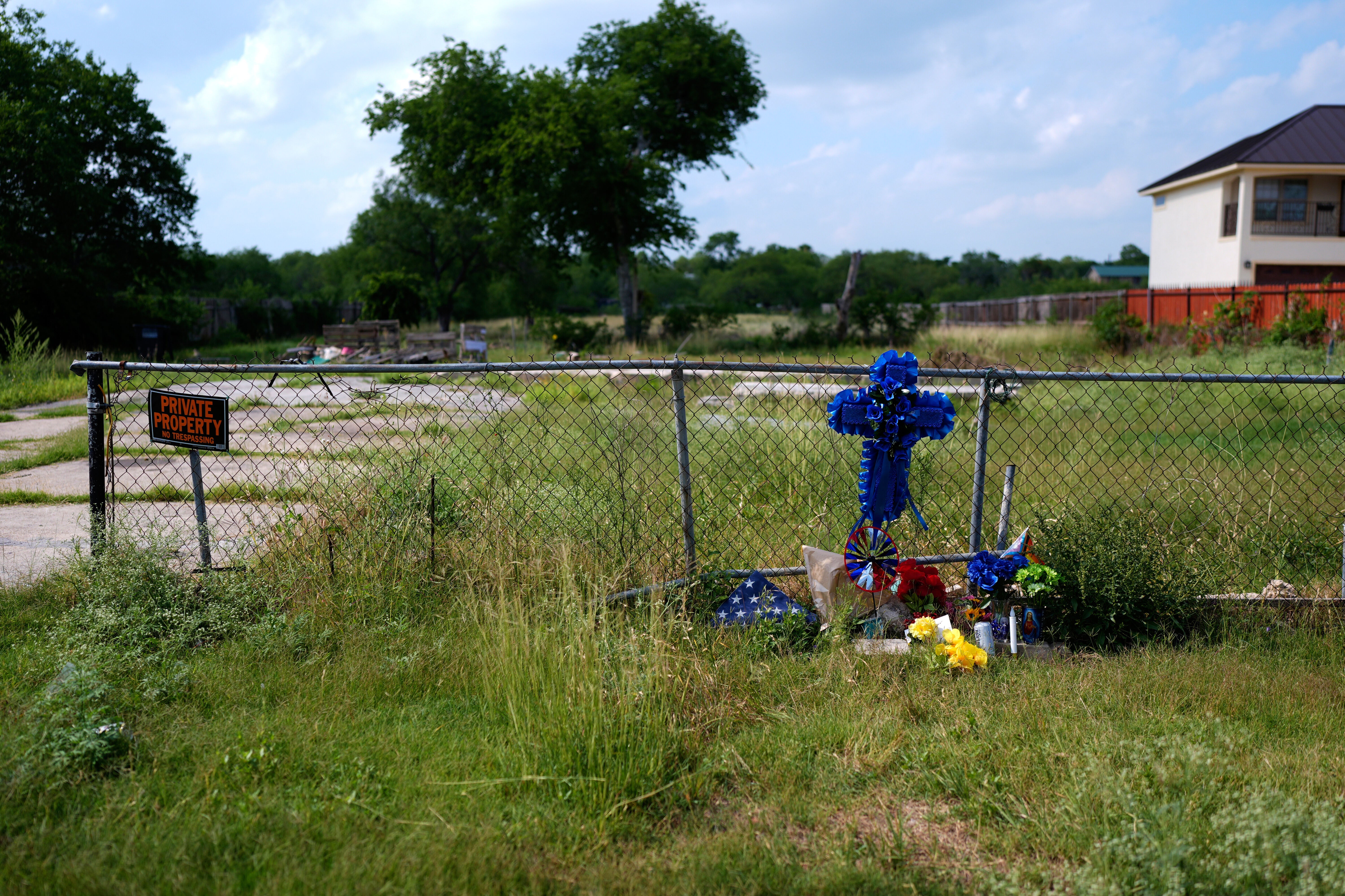 A makeshift memorial stands near the spot where Jonathan Joss was killed