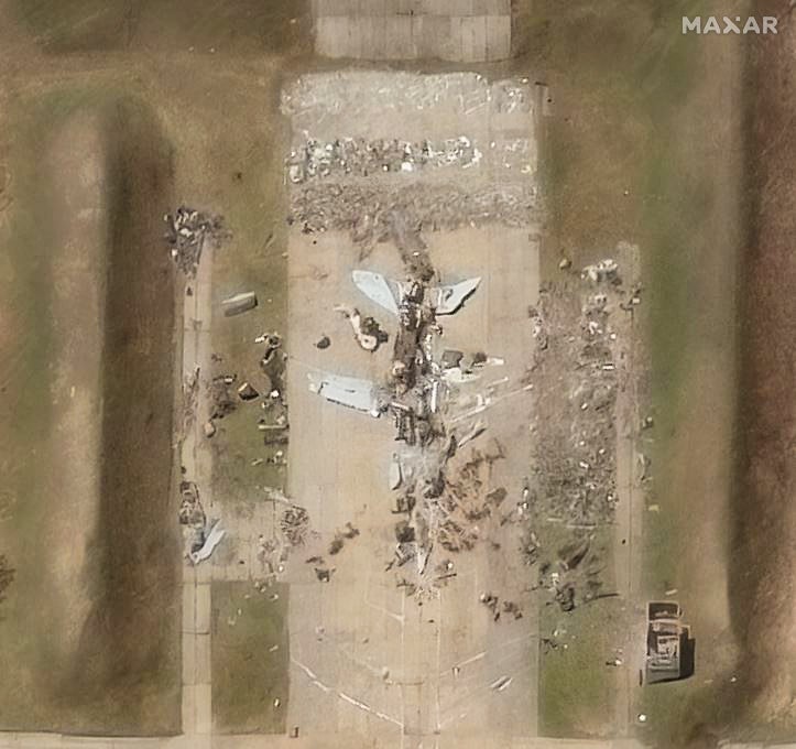 Satellite picture courtesy of Maxar Technologies shows a damaged decoy aircraft at Belaya Airbase in Usolsky district in Irkutsk oblast in Russia