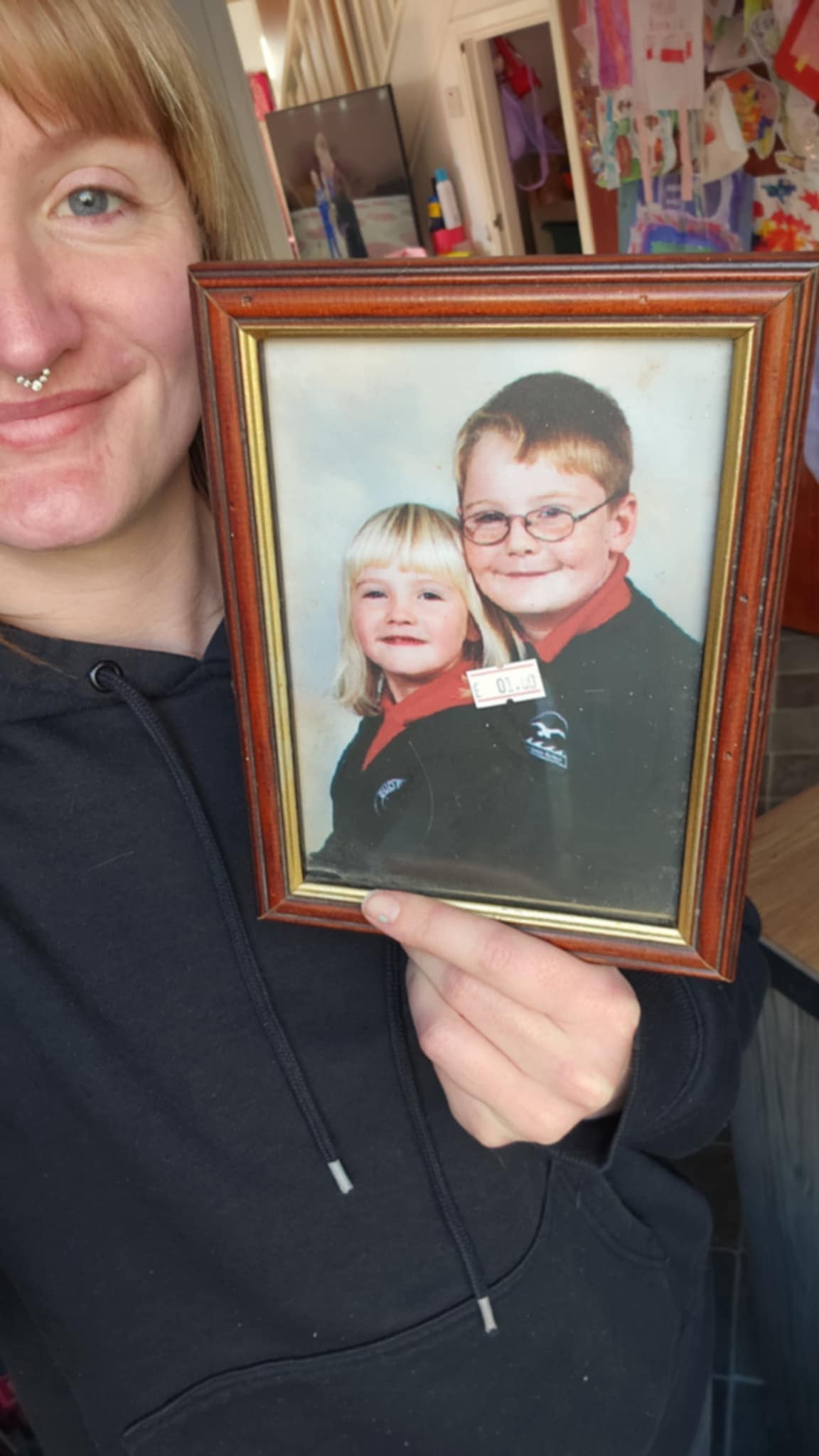 Jade Kirkum reunited with the school photo (Family handout/PA)