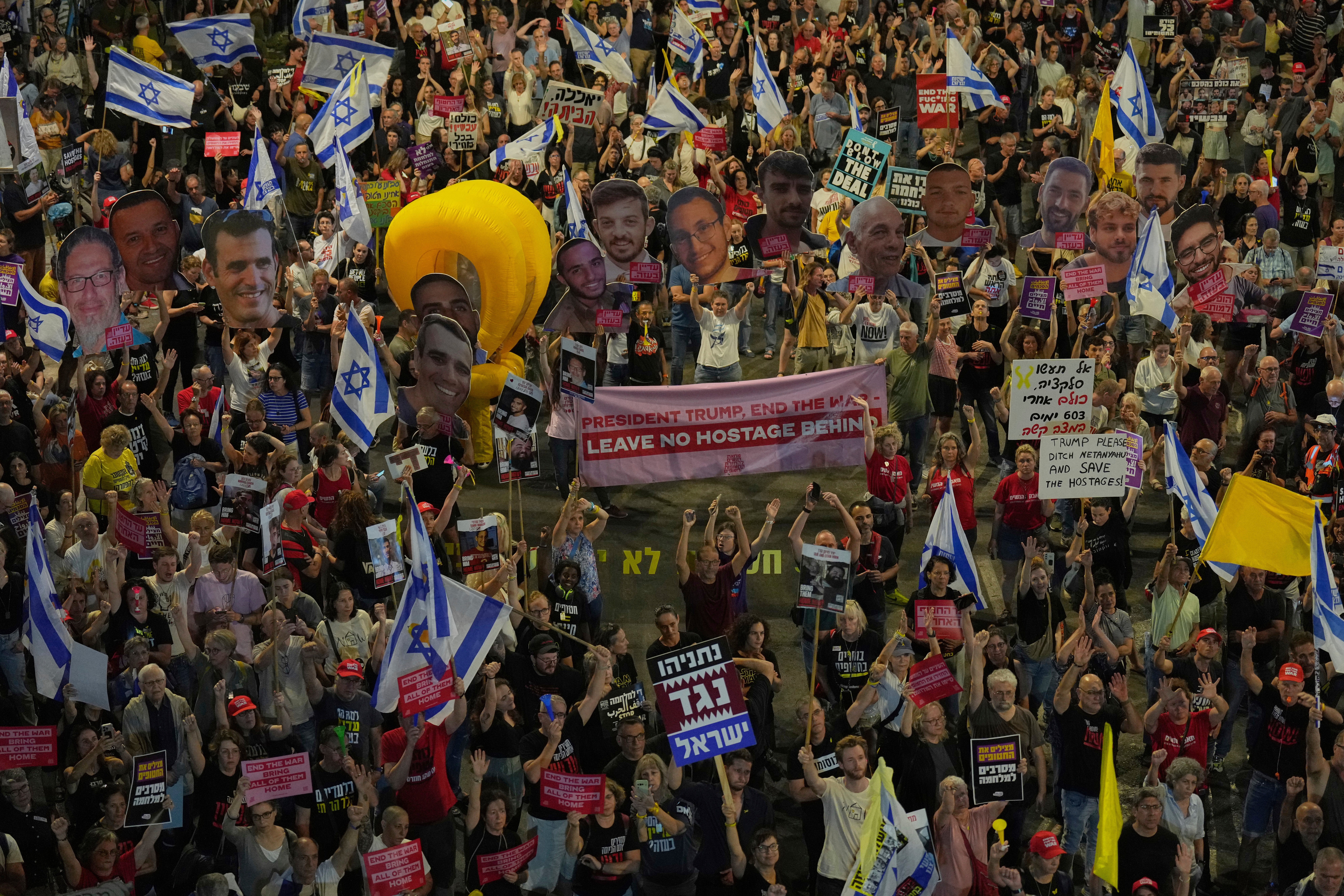 People in Tel Aviv take part in a protest demanding the end of the war and immediate release of hostages held by Hamas in the Gaza Strip, and against Prime Minister Benjamin Netanyahu's government