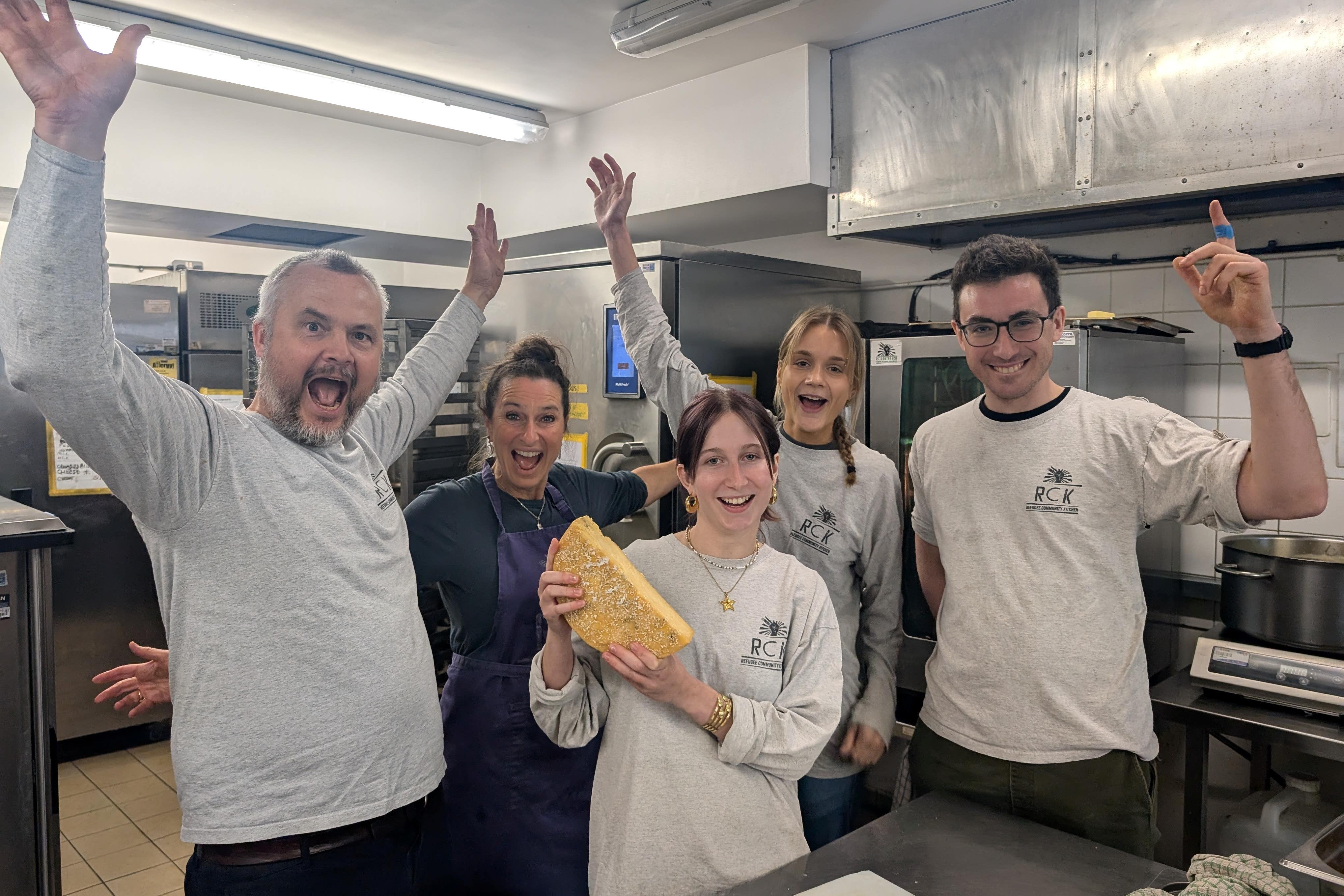 The winning Double Gloucester was used by volunteers at Refugee Community Kitchen to prepare a meal (Lynn Rusk/PA)