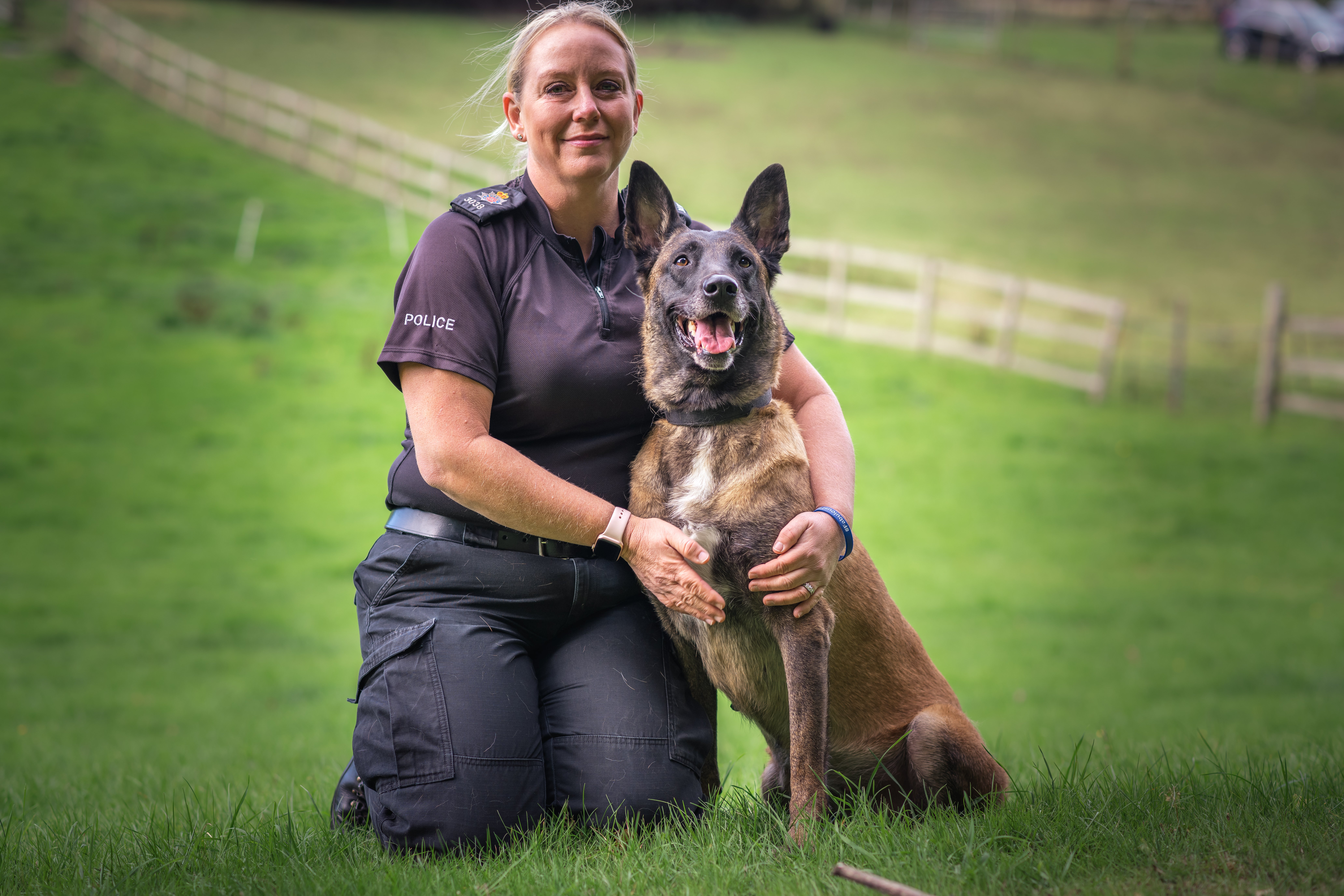 Dog handler Claire Bird with retired police dog Fiji