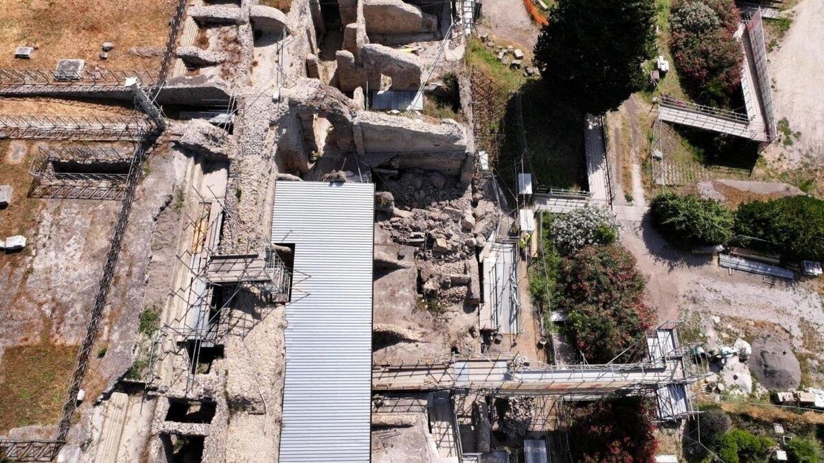 A drone view shows the partial collapse of a wall and a portion of a vault in the insula Meridionalis of the archaeological area of Pompeii, following a seismic swarm in the Campi Flegrei