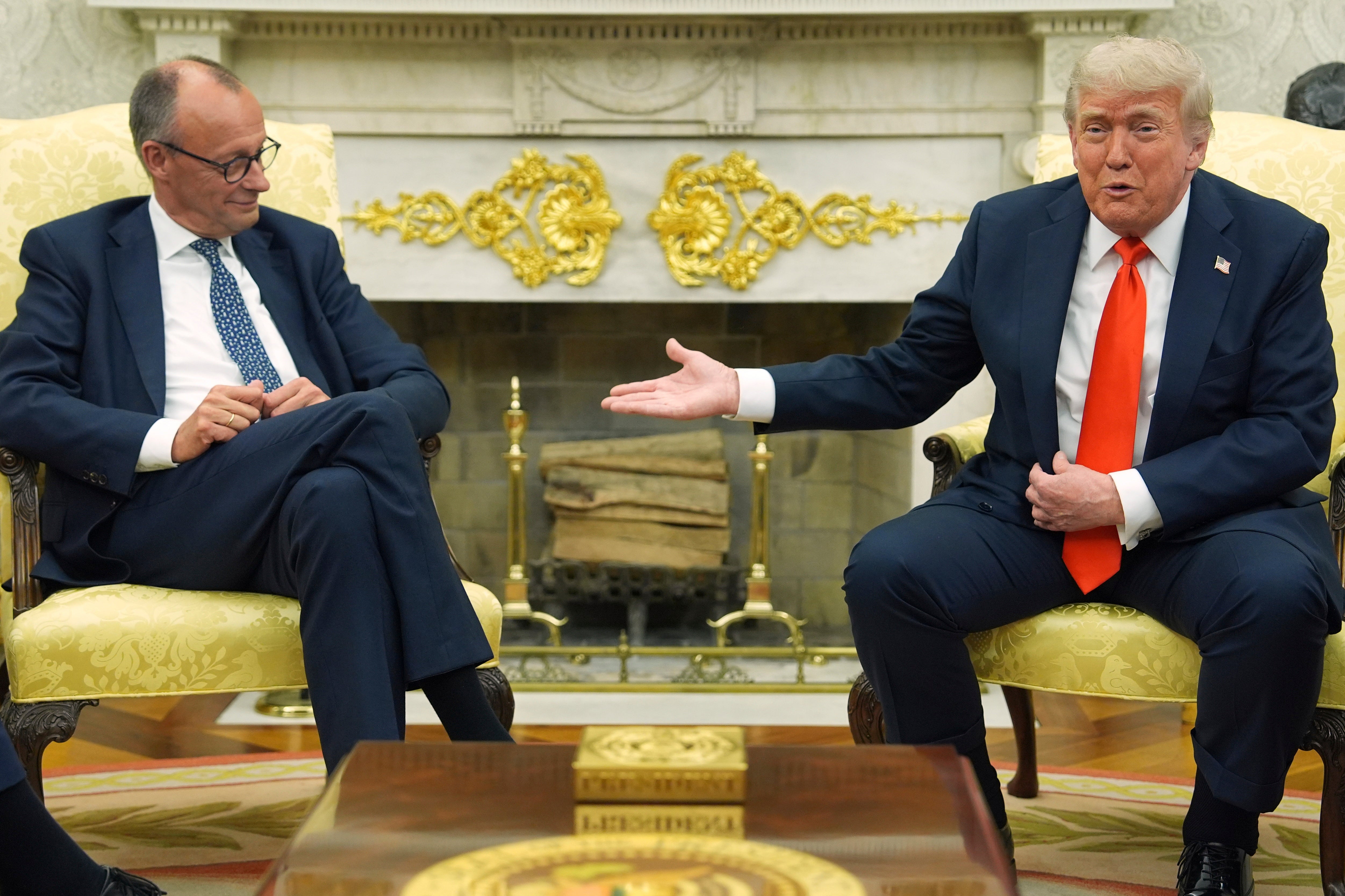 President Donald Trump, right, meets Germany's Chancellor Friedrich Merz in the Oval Office