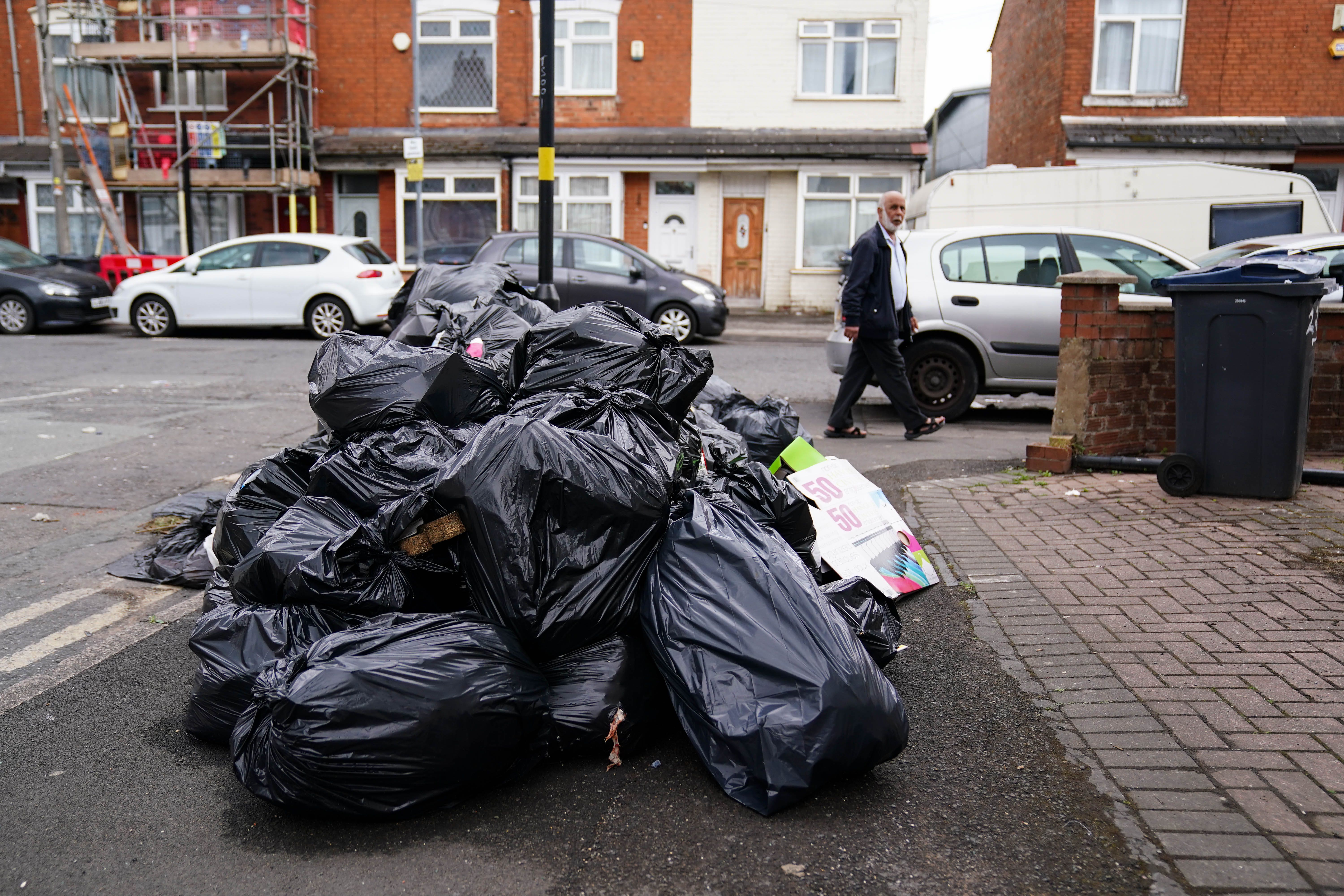Uncollected refuse bags in the Sparkhill area of Birmingham (Jacob King/PA)