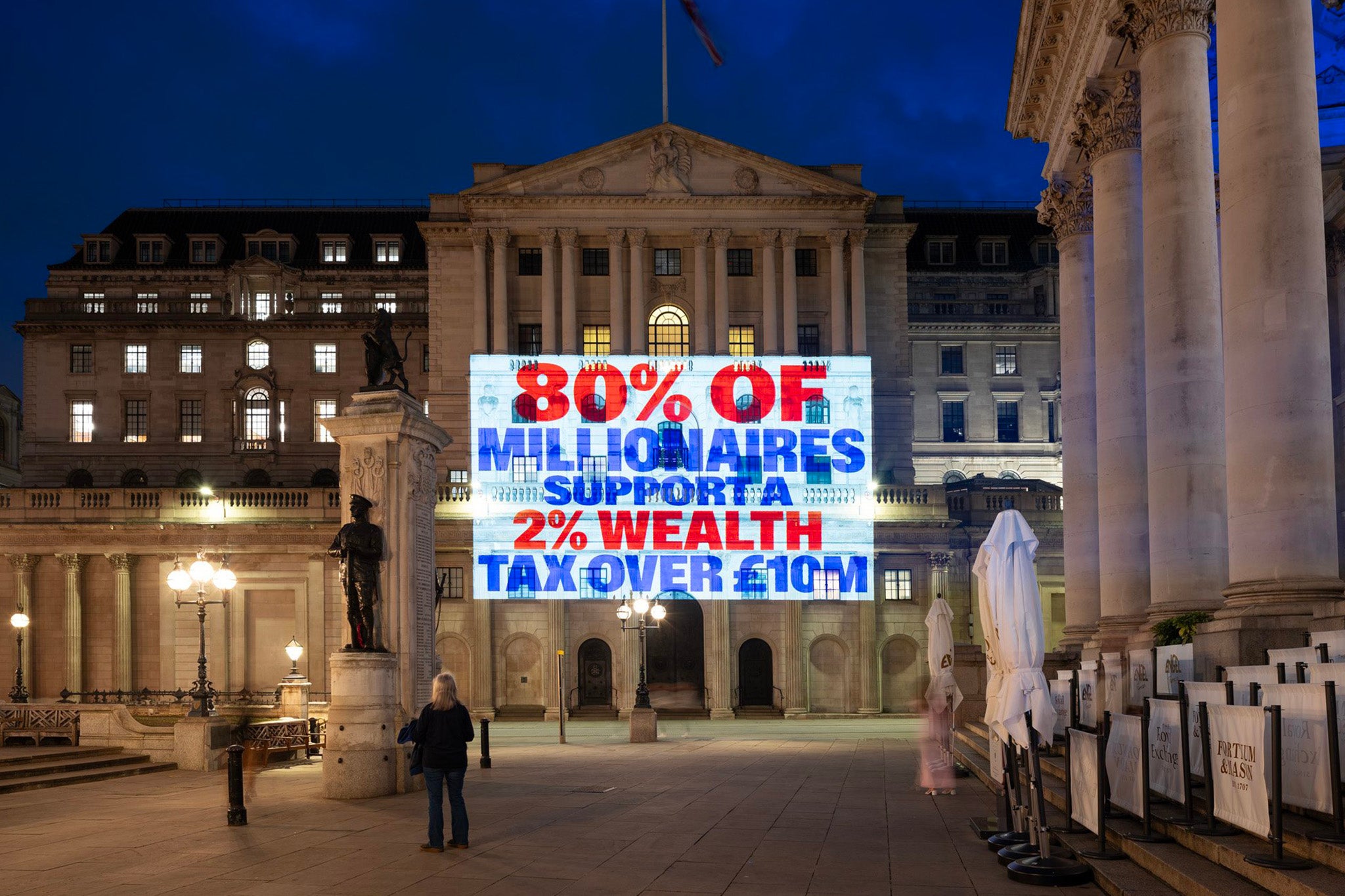 Images projected onto the Bank of England building by Patriotic Millionaires UK earlier this week