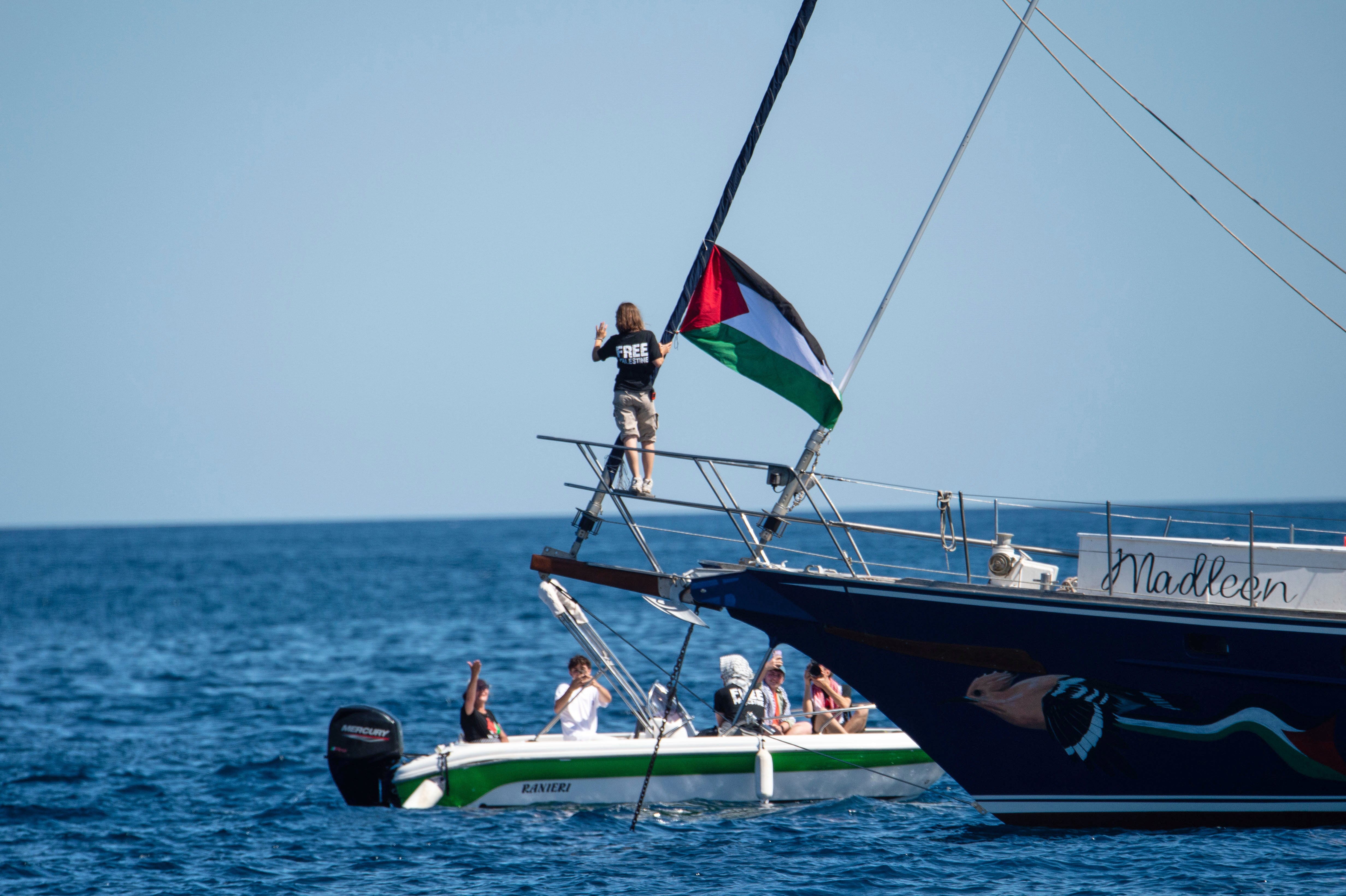 Climate activist Greta Thunberg with activists of the Freedom Flotilla Coalition, departing from Siciliy, Sunday, June 1, 2025. (AP Photo/Salvatore Cavalli)