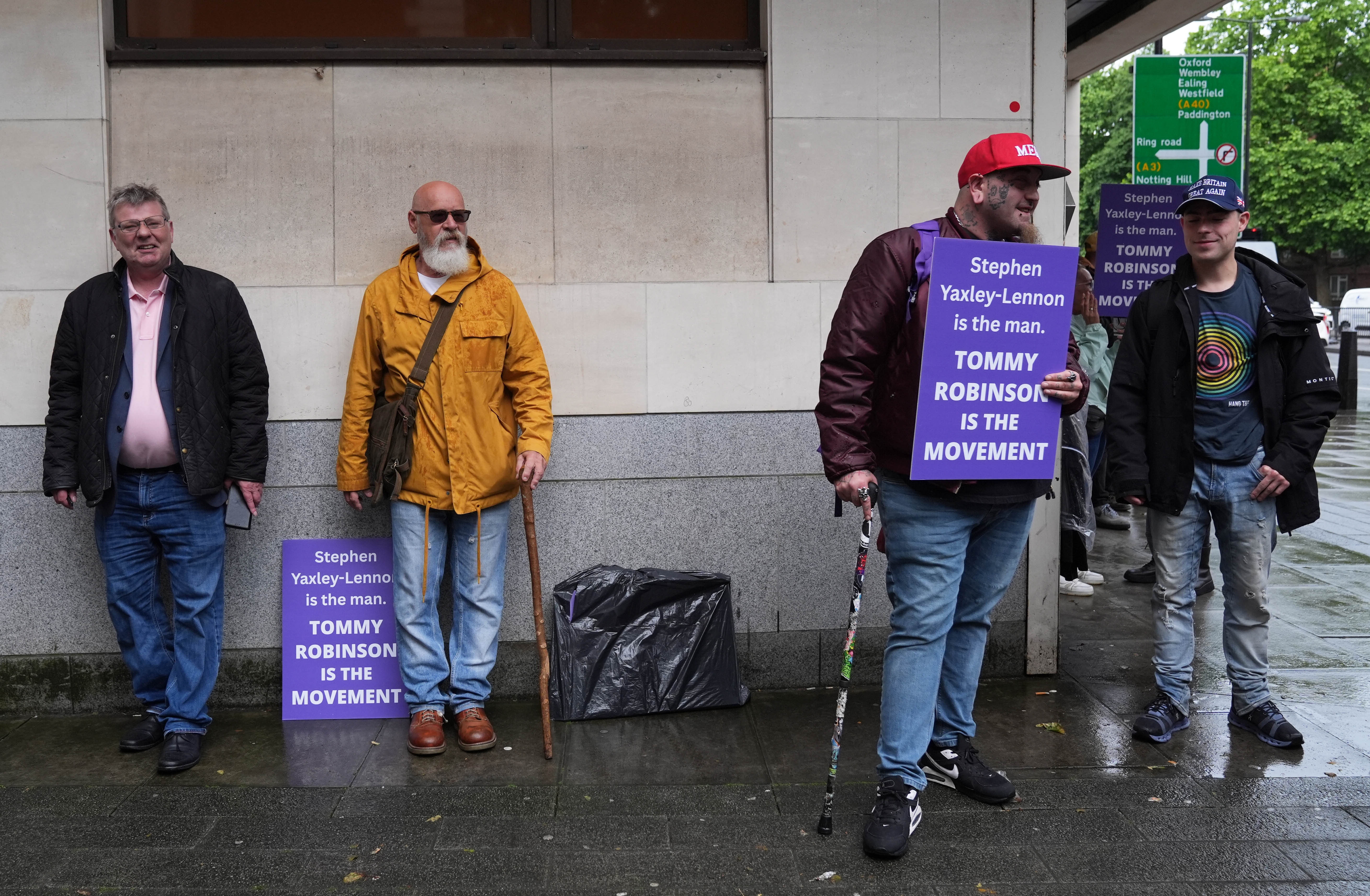 Supporters outside Westminster Magistrates' Court, central London, where Tommy Robinson, whose real name is Stephen Yaxley-Lennon is charged with harassment of two journalists between August 5 and 7 2024. Picture date: Thursday June 5, 2025. PA Photo. See PA story COURTS Robinson. Photo credit should read: Maja Smiejkowska/PA Wire