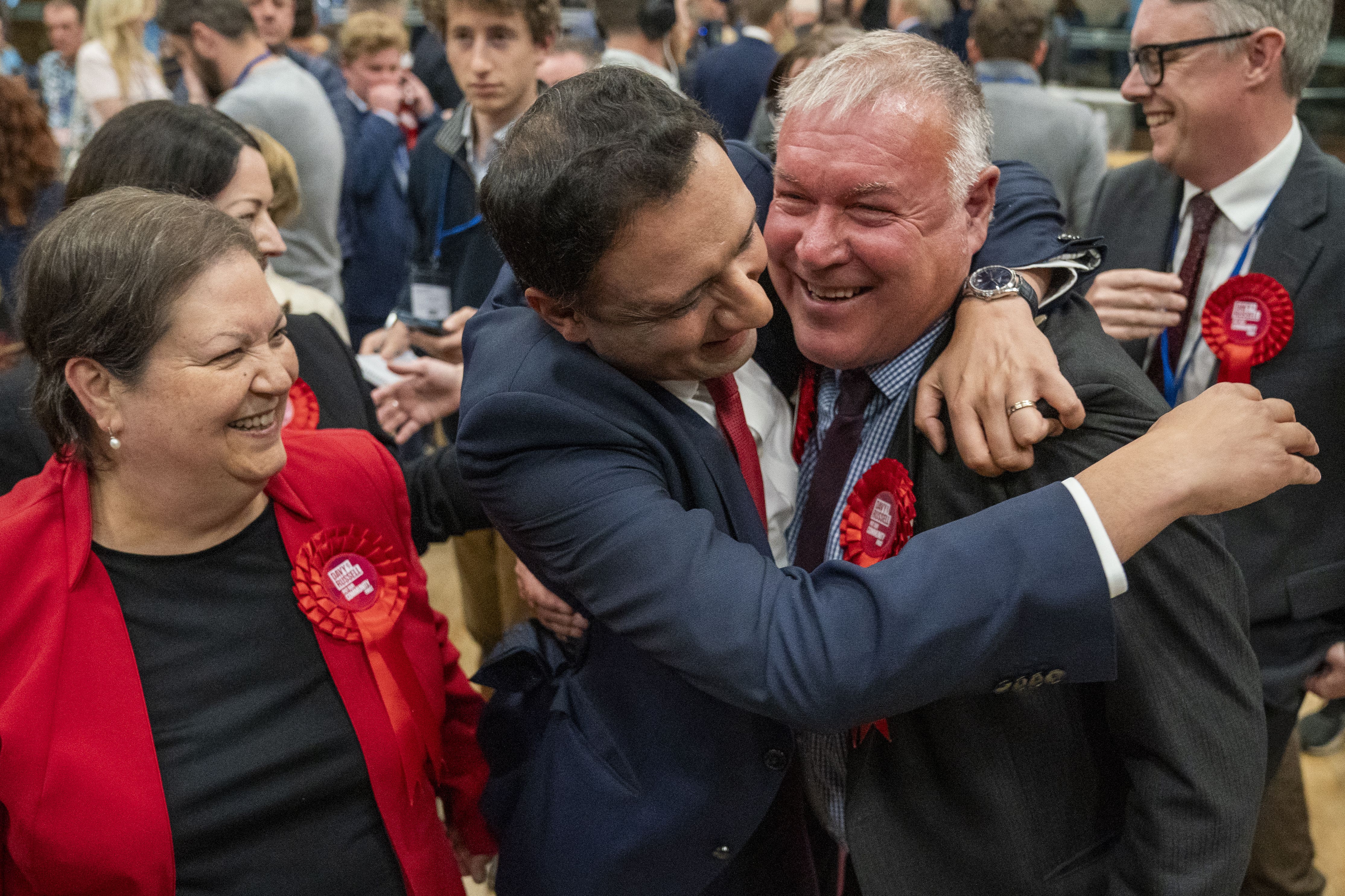 New MSP Davy Russell (right) celebrates with Scottish Labour leader Anas Sarwar (centre) as party deputy leader Jackie Baillie looks on. (Jane Barlow/PA)