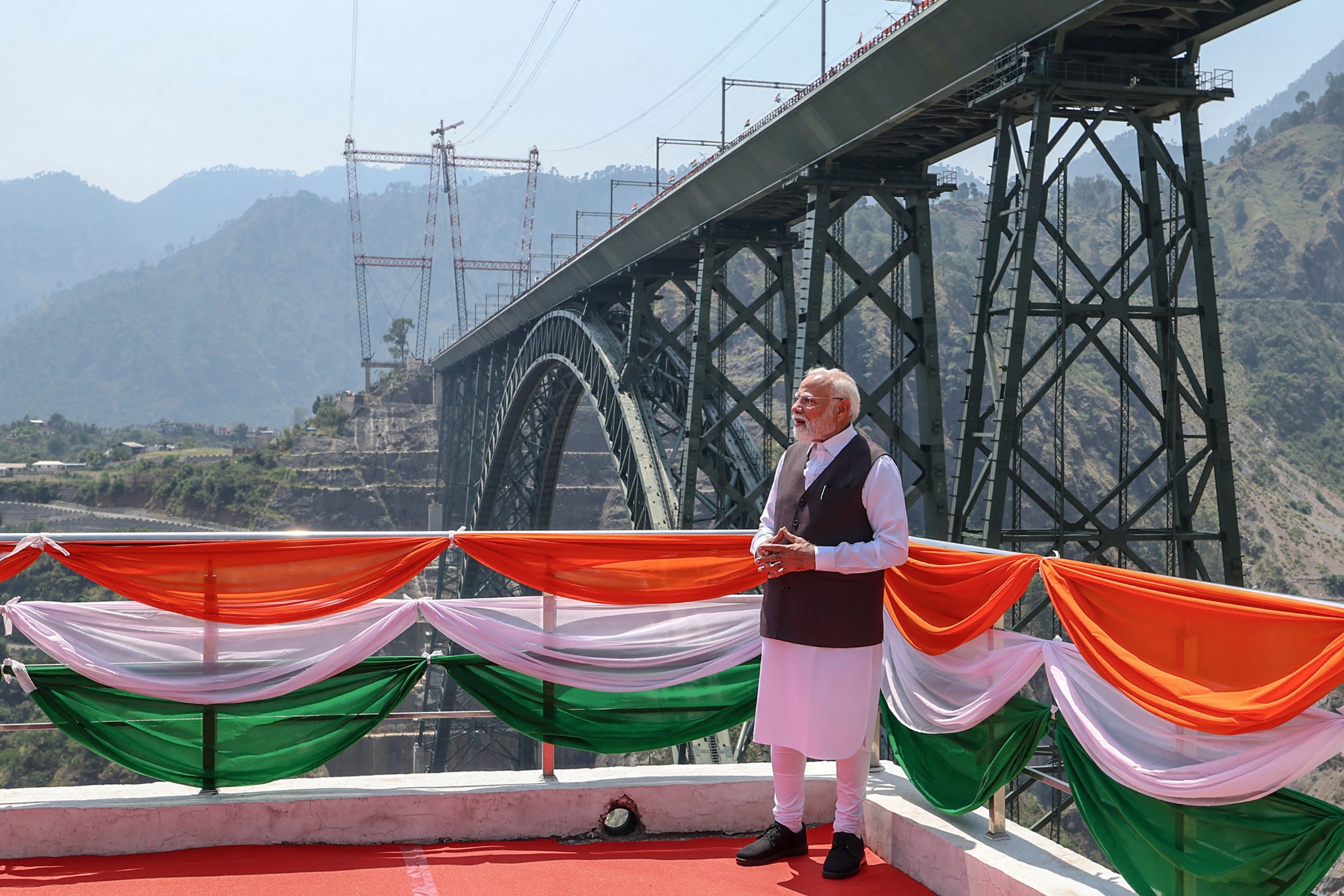 India's Prime Minister Narendra Modi visiting Chenab Rail Bridge during the inauguration of the Kashmir rail link, in Reasi, in Jammu and Kashmir