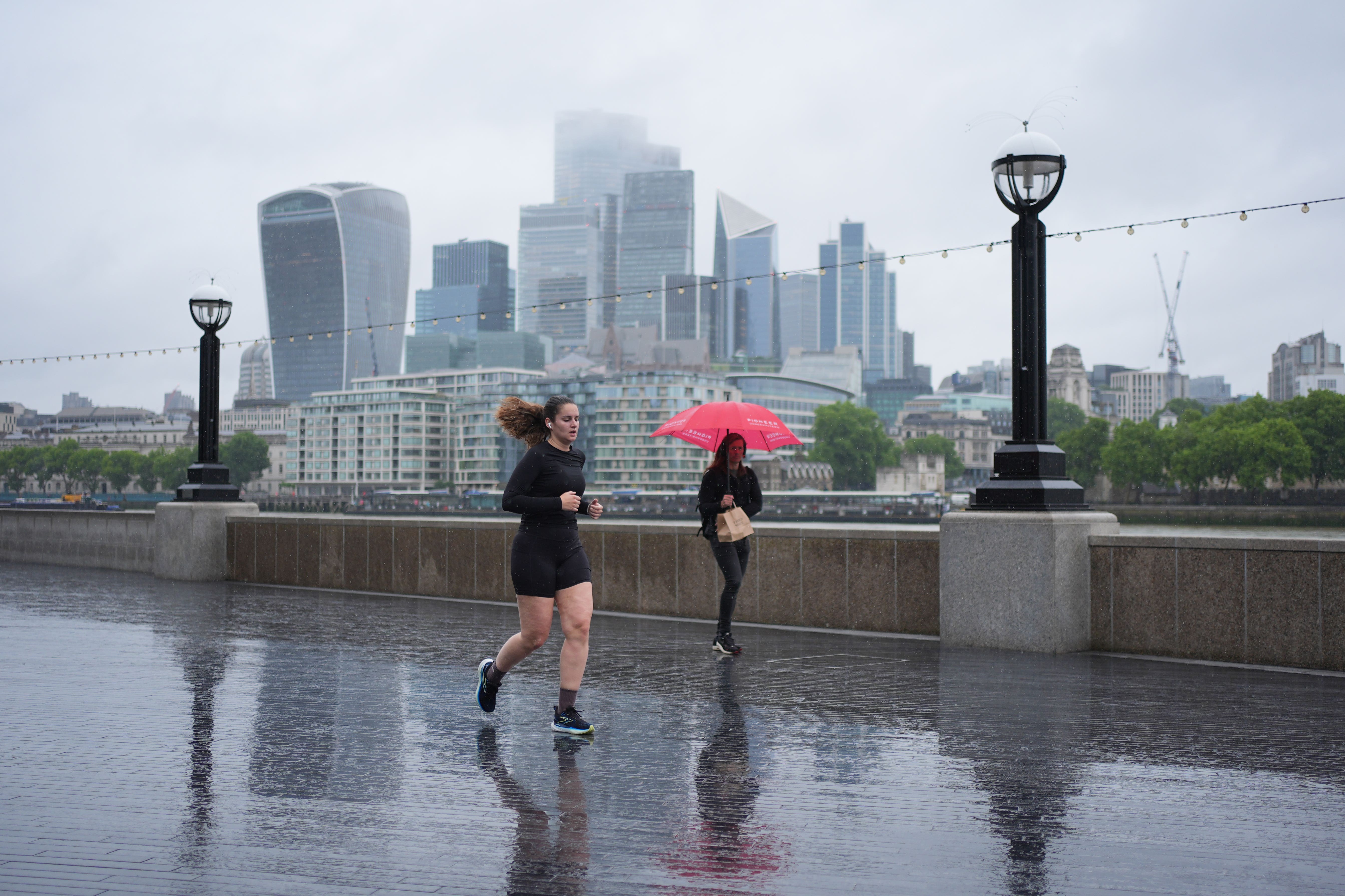 ‘Frequent lightning, hail, and strong, gusty winds’ were possible, the Met Office said (Yui Mok/PA)