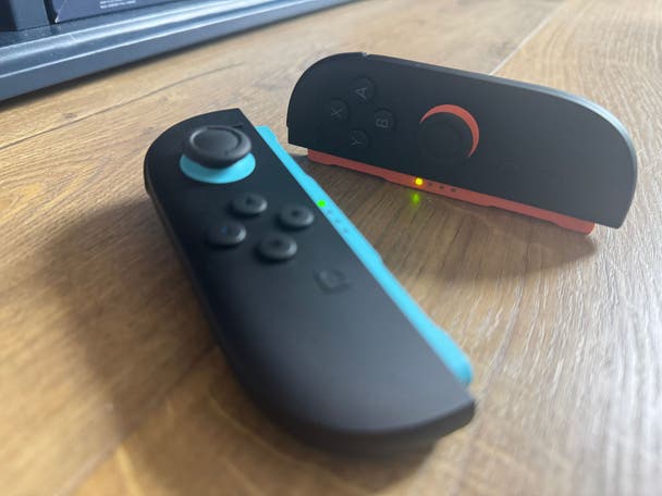 Joy-Con 2 controllers in mouse mode on a desk