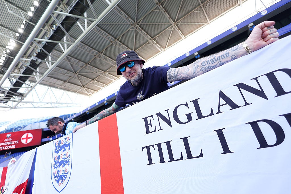 England fans pose with banners at the Andorra game in Barcelona on 7 June