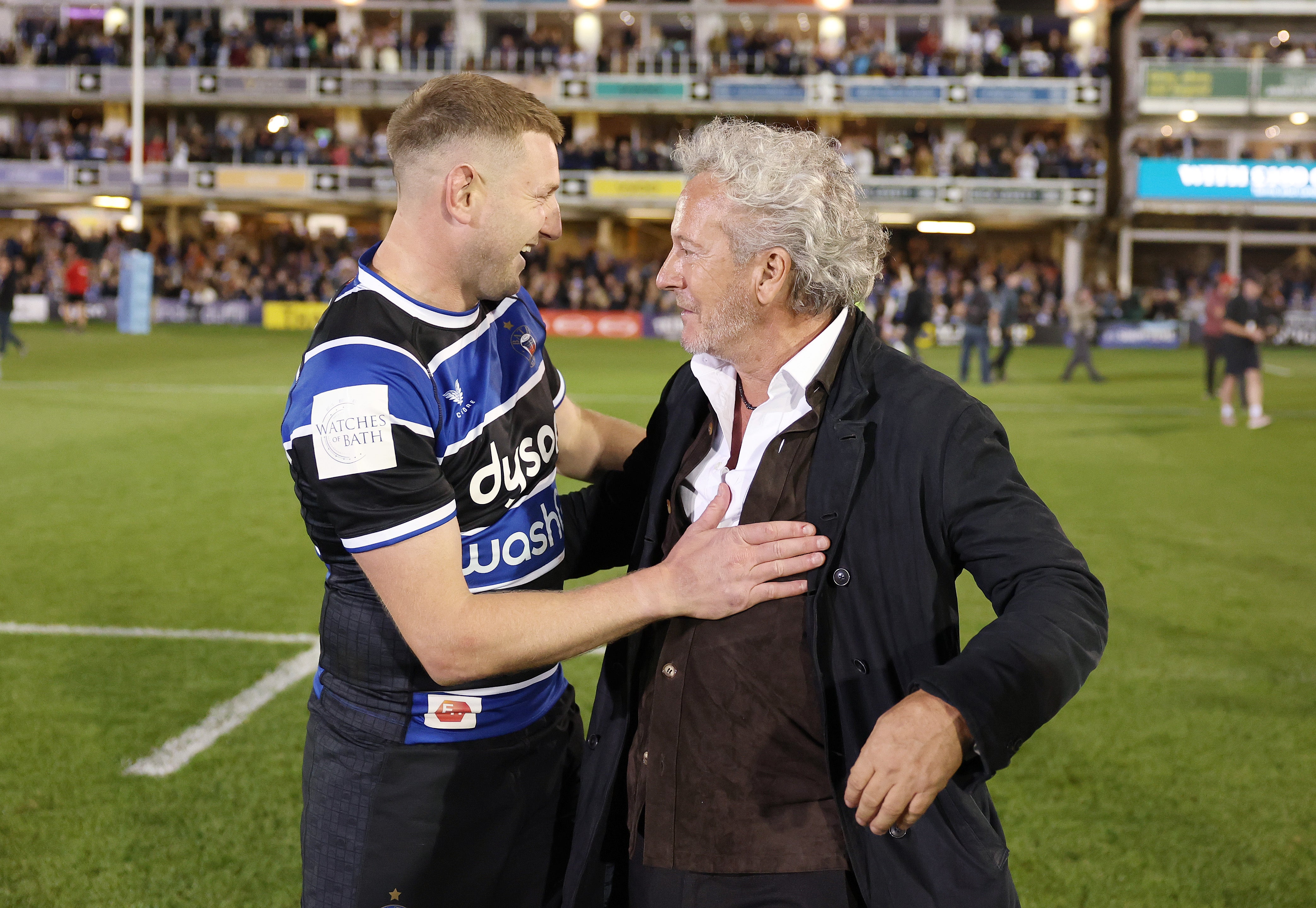 Finn Russell (left) celebrated with Bath owner Bruce Craig after leading the side to the Premiership final
