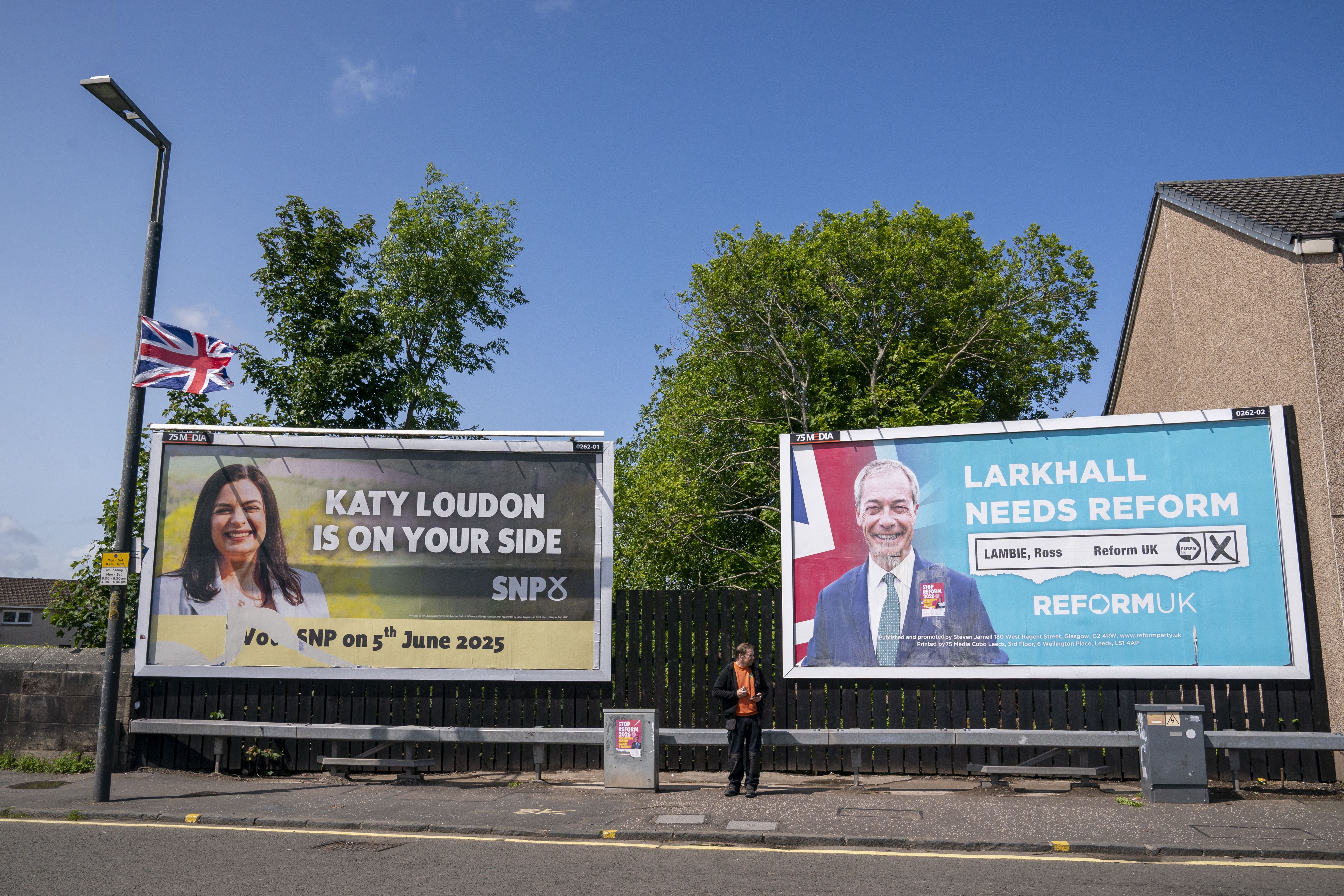 SNP and Reform UK election billboard posters in Larkhall, Lanarkshire ahead of the by-election (Jane Barlow/PA)