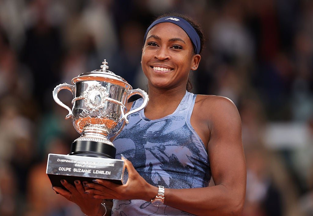 Gauff holds the French Open trophy after defeating top seed Sabalenka