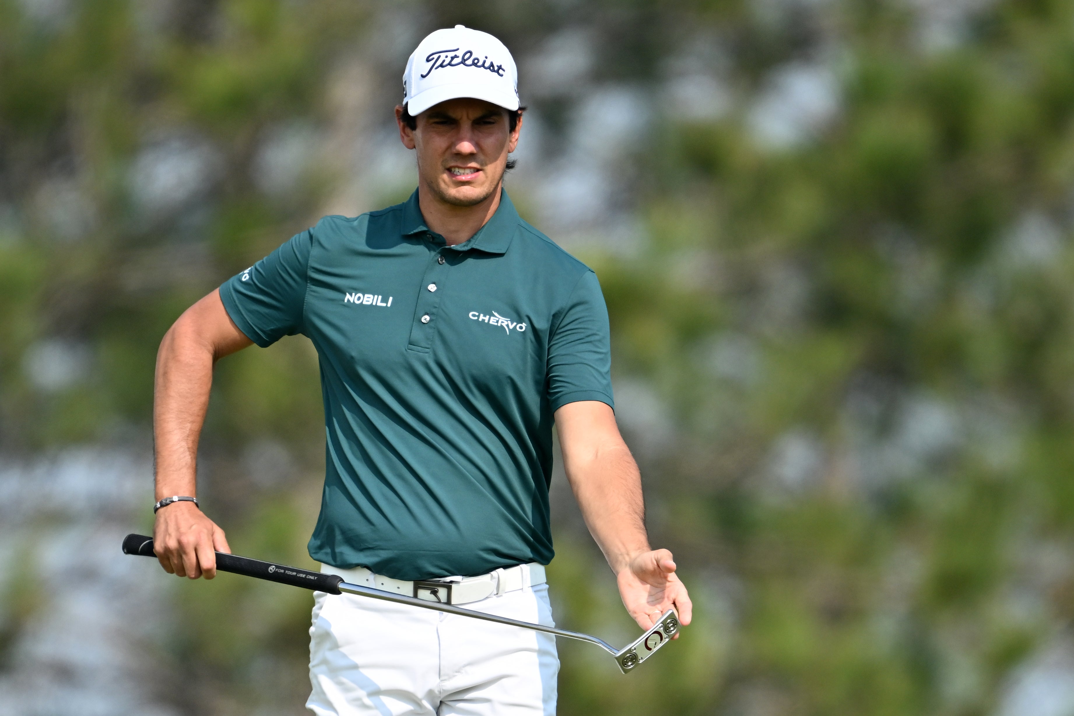 Matteo Manassero made the most of good scoring conditions to take a share of the lead into Sunday