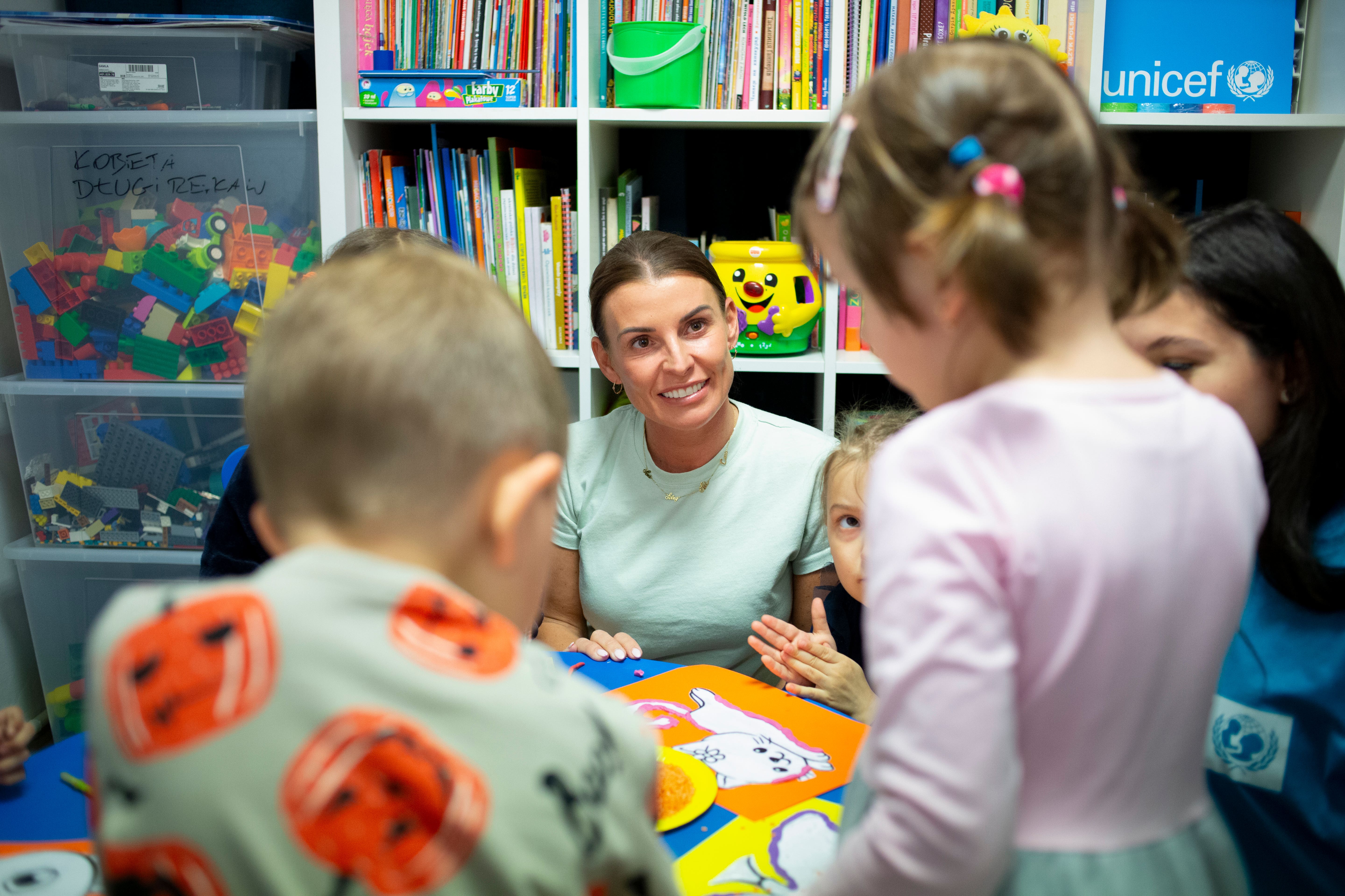 Unicef high-profile supporter Coleen Rooney during a workshop with children at the Spilno Centre (Unicef/Brykczynski/PA)