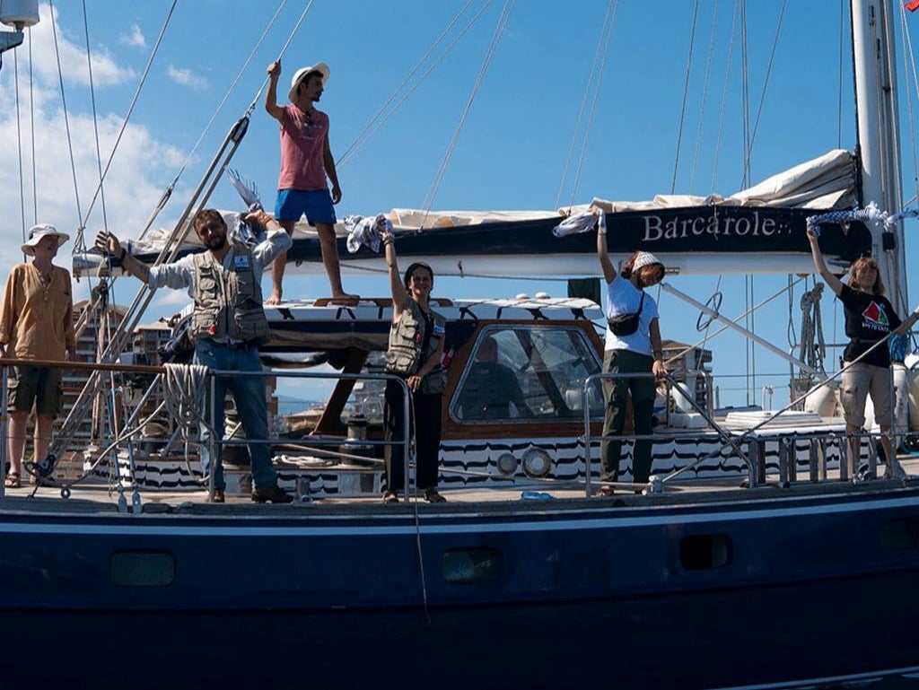 Activist Greta Thunberg and crew stand aboard the aid ship Madleen, which left the Italian port of Catania on June 1 to travel to Gaza to deliver humanitarian aid, in this picture released on June 2, 2025 on social media