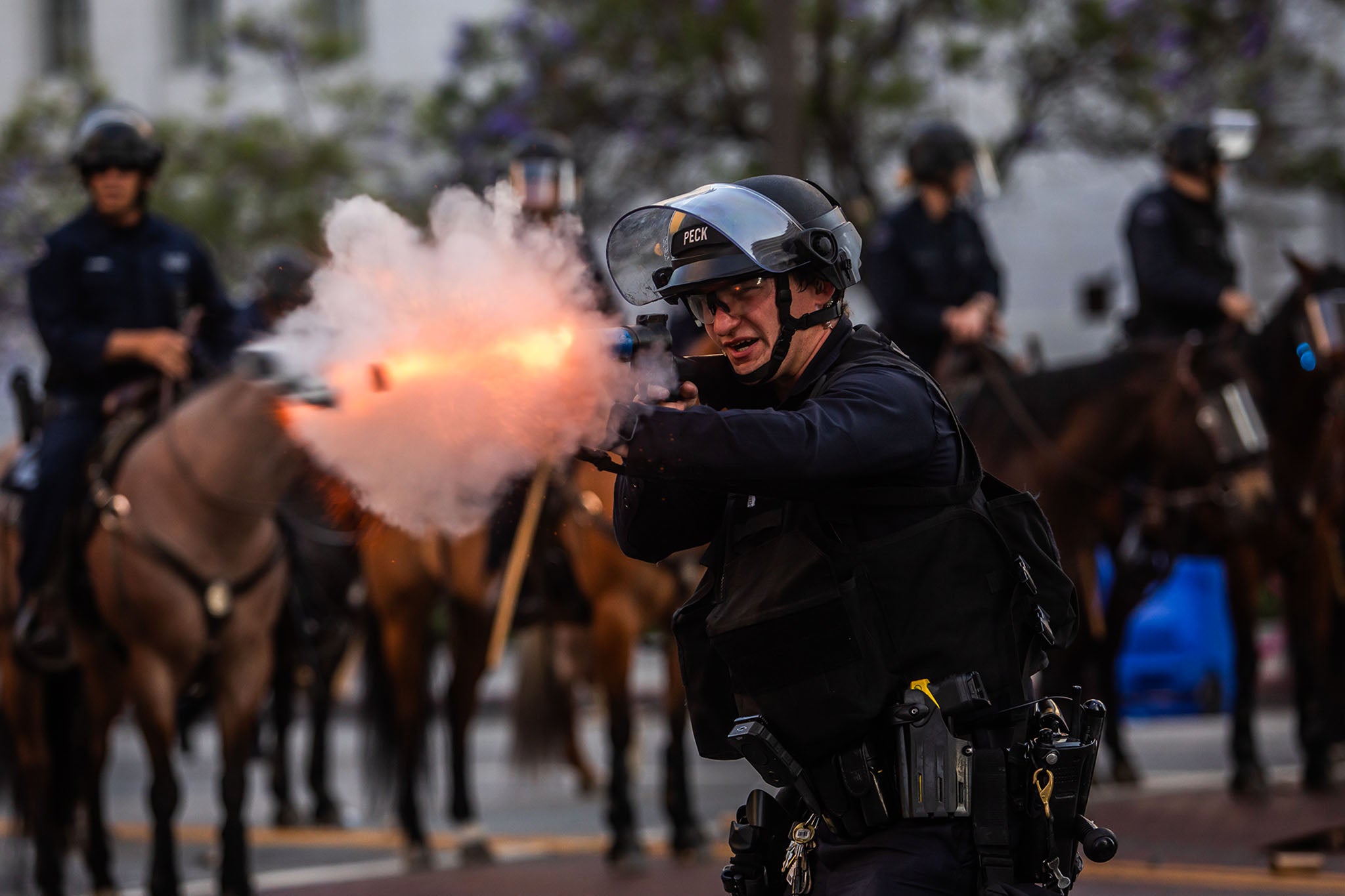 LAPD officers shoot rubber bullets at protesters in front of City Hall