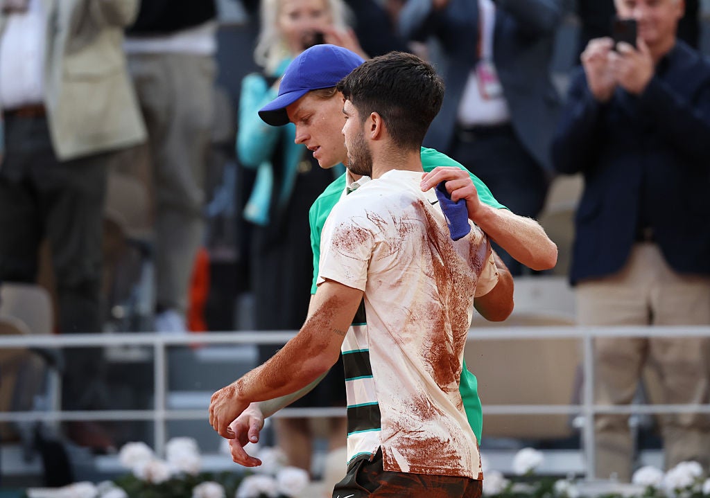 Alcaraz embraces Sinner after winning the longest ever French Open final at five hours and 29 minutes