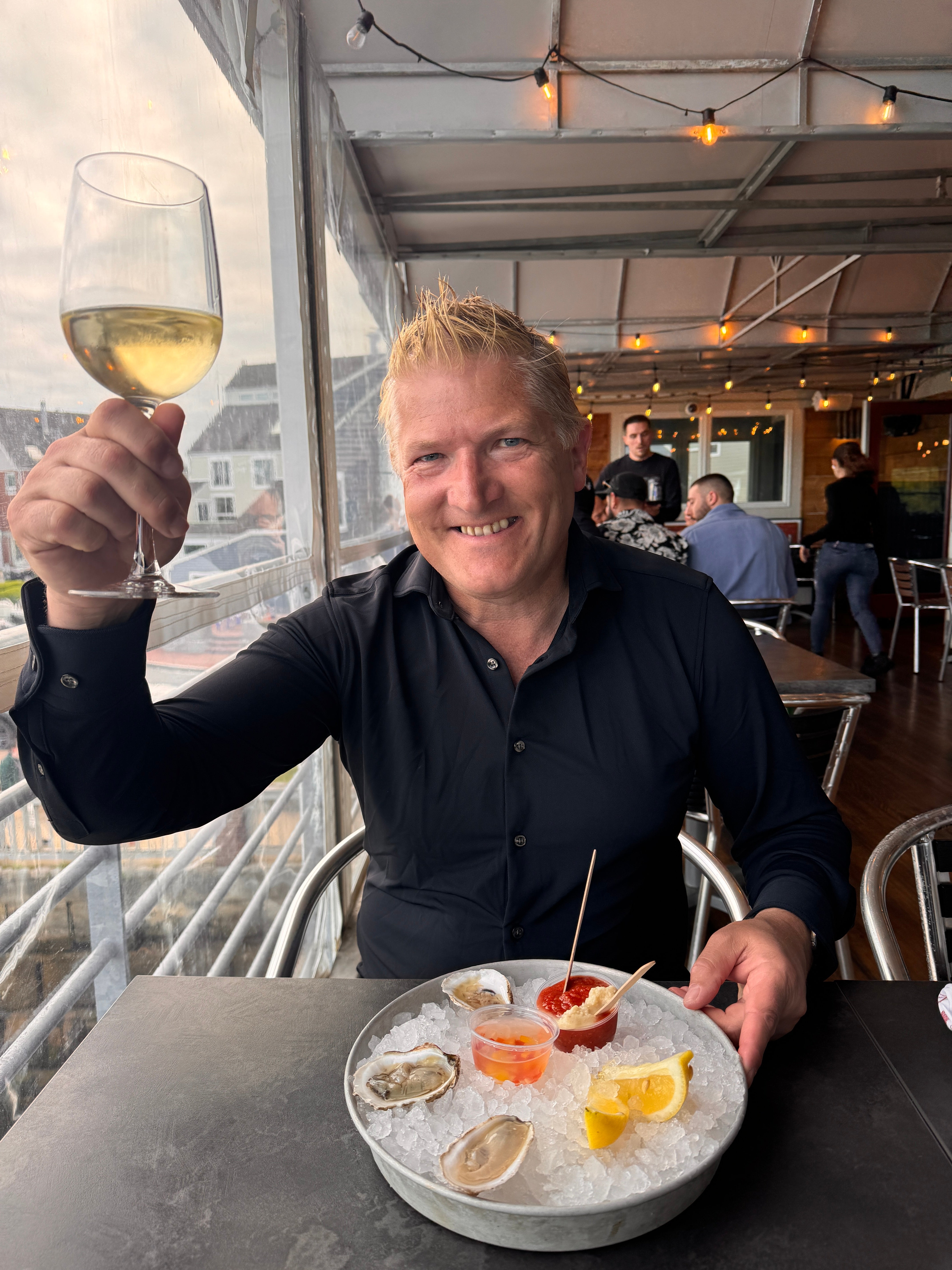 Raising a glass at the Sea Level Oyster Bar