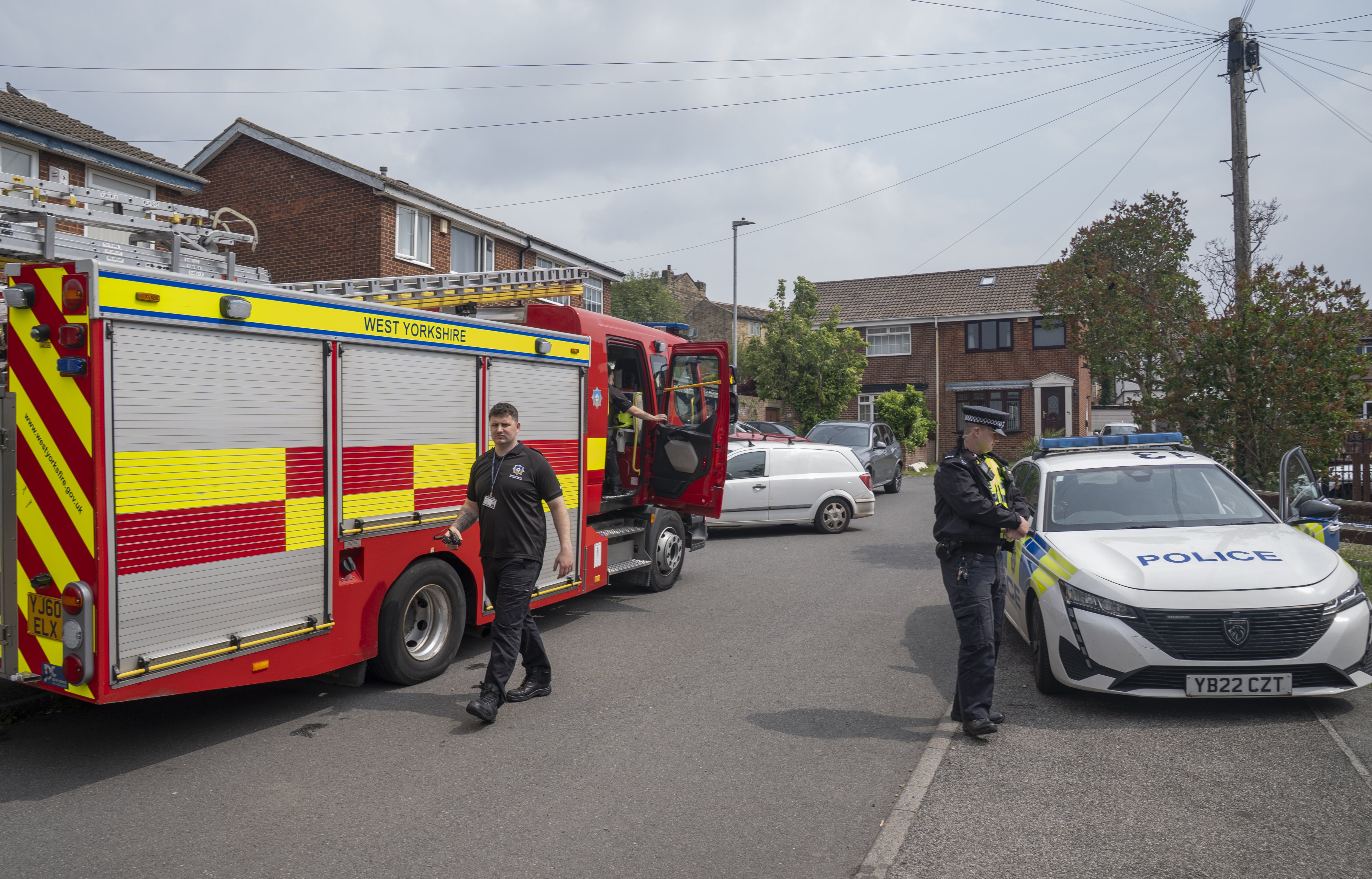 Emergency services at the scene in Russell Close, Heckmondwike, West Yorkshire