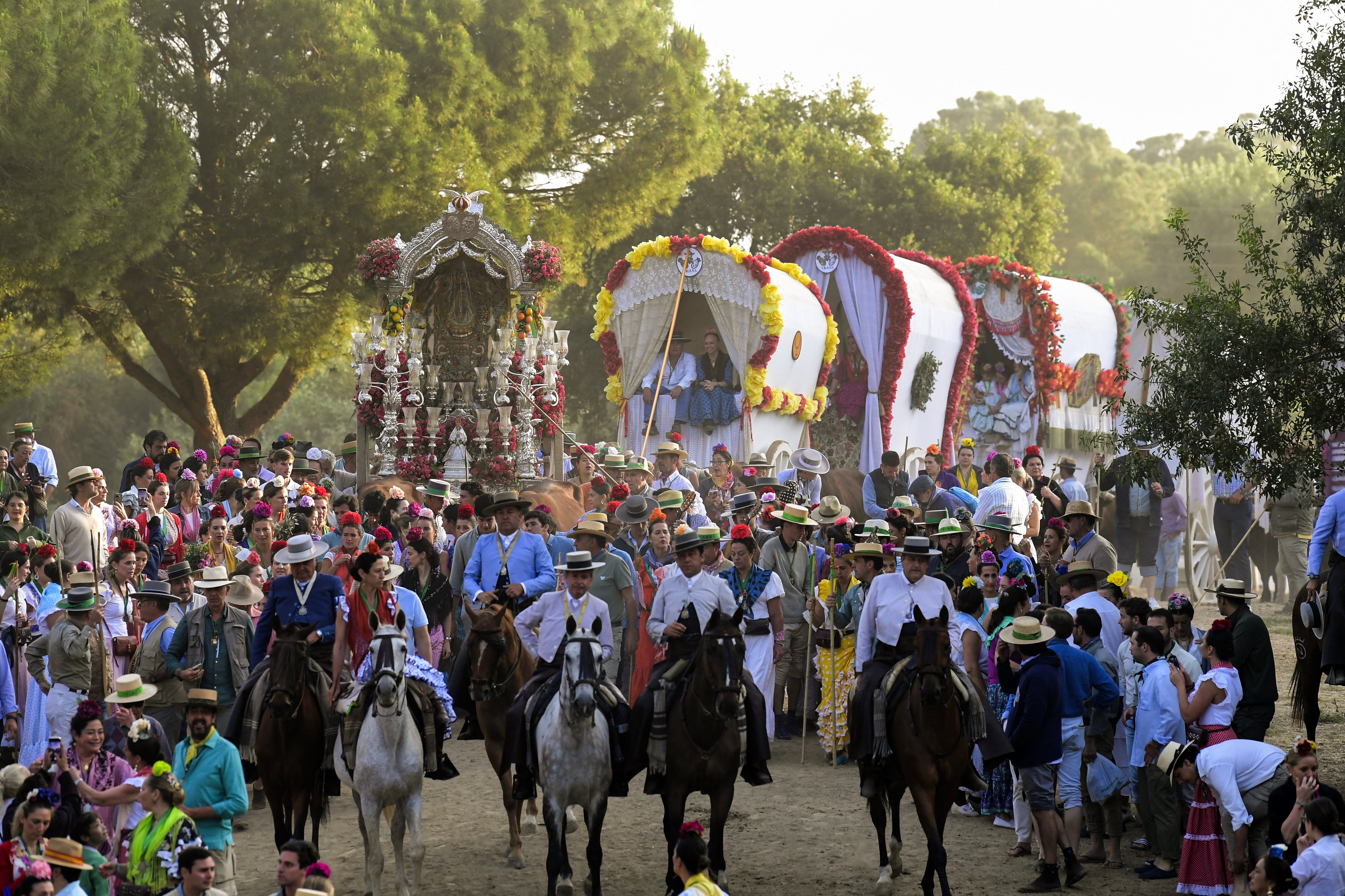 Hundreds of thousands of devotees in traditional outfits converge in a burst of color in the El Rocio pilgrimage