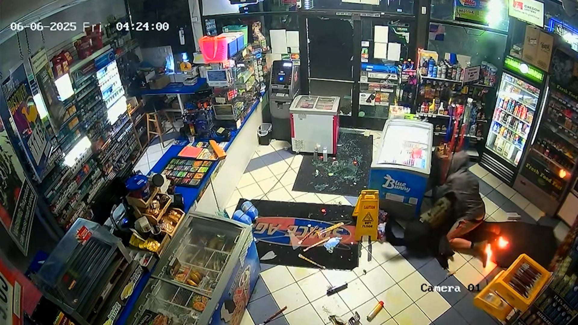 Bizarre moment burglar breaks into Oregon gas station, sets himself on fire, fights K9 then gives up