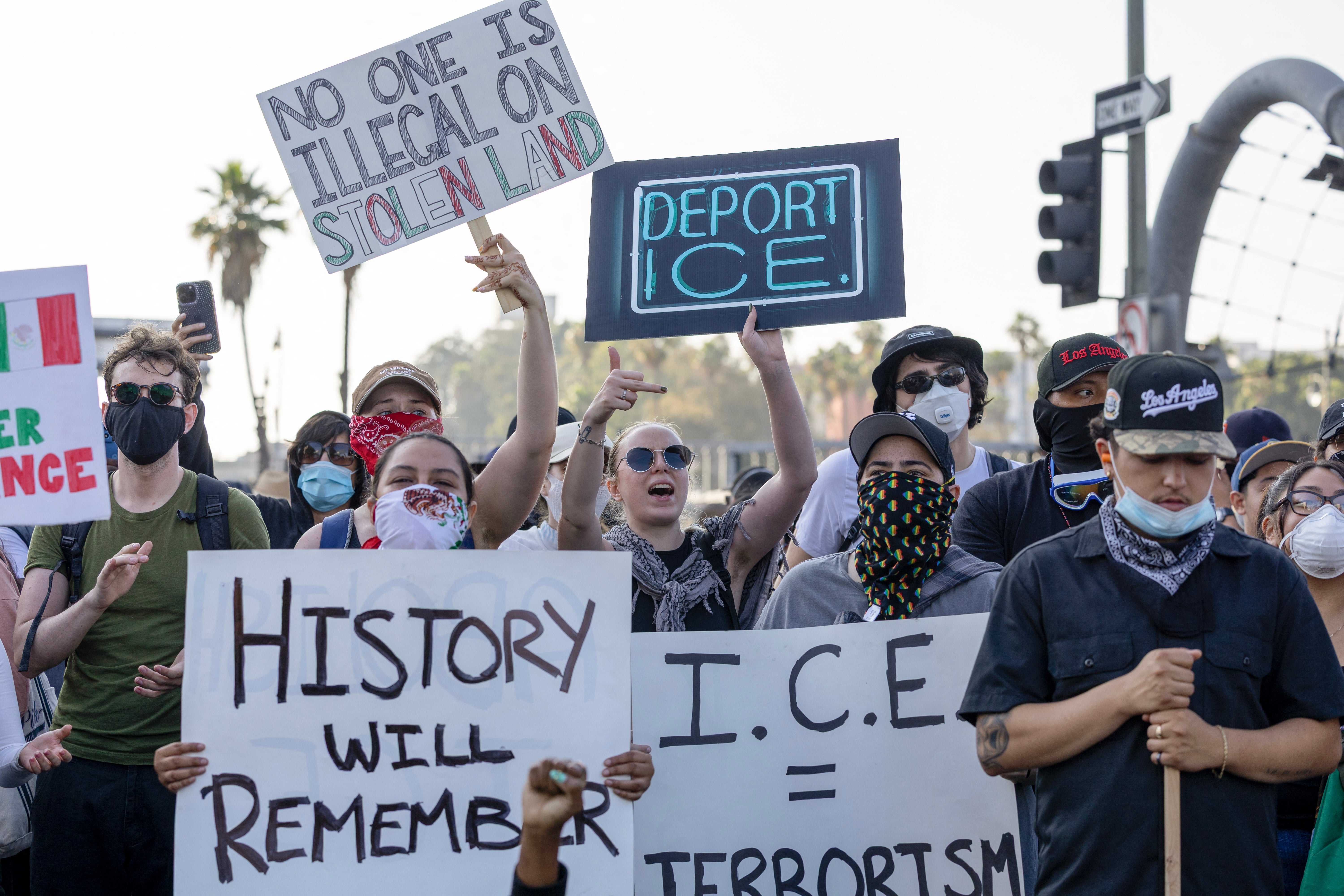 Protesters clash with law enforcement in the streets on Sunday surrounding the federal building during a protest following ICE operations in Los Angeles