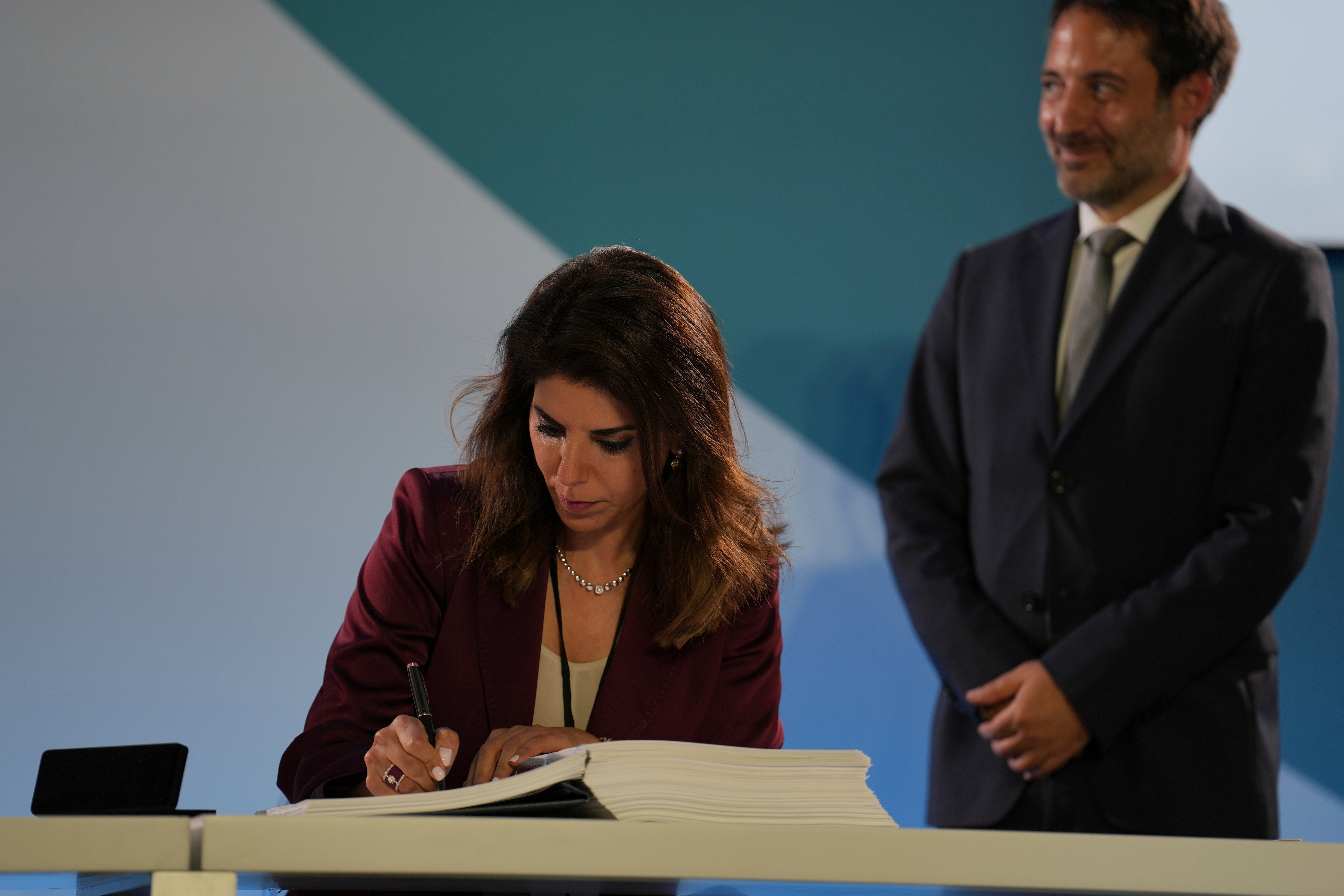 Diplomat Leena Al-Hadid of Jordan signs the High Seas Treaty during the UN Ocean Conference