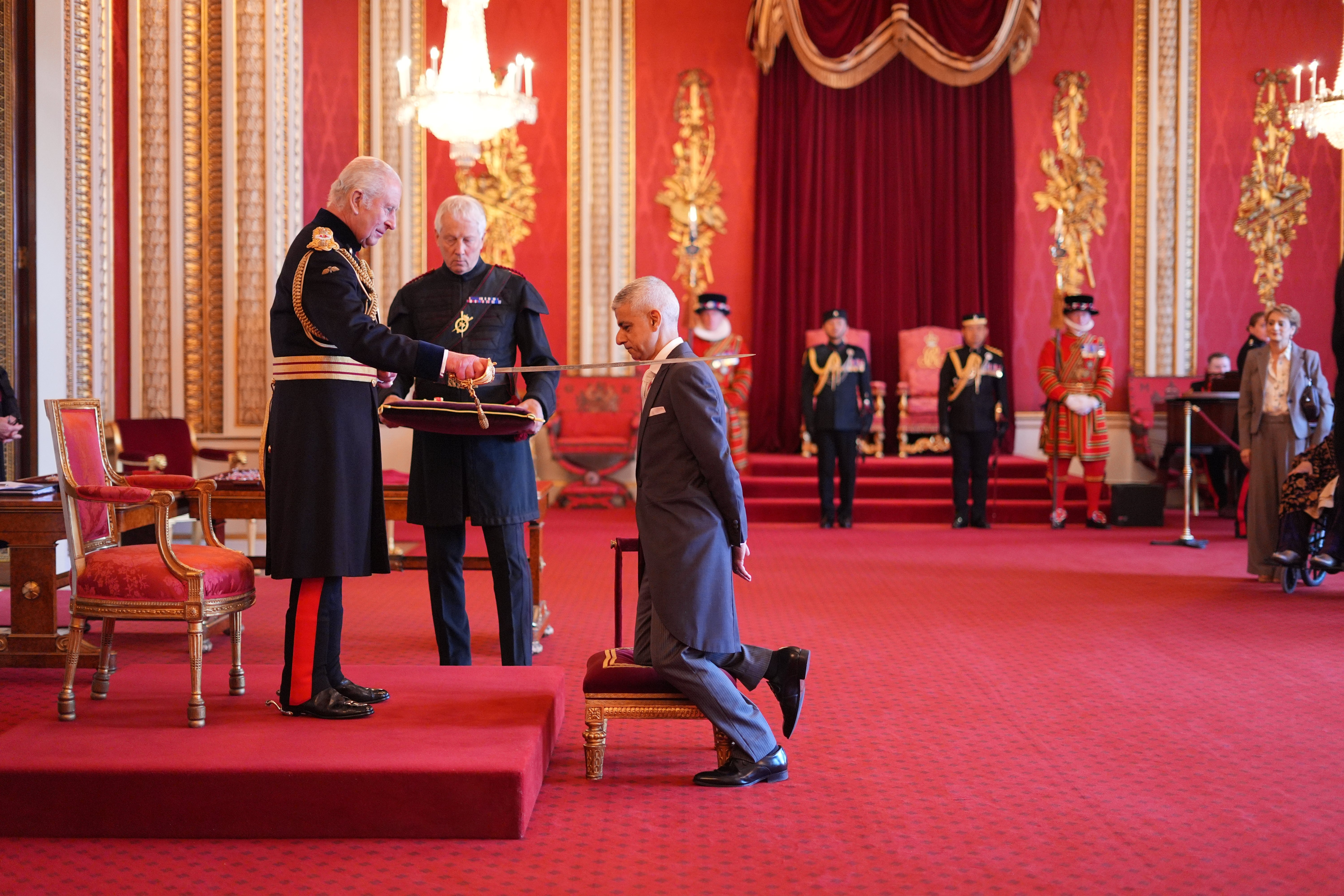 The Right Honourable Sir Sadiq Khan, from London, Mayor of London, is made a Knight Bachelor by King Charles III at Buckingham Palace