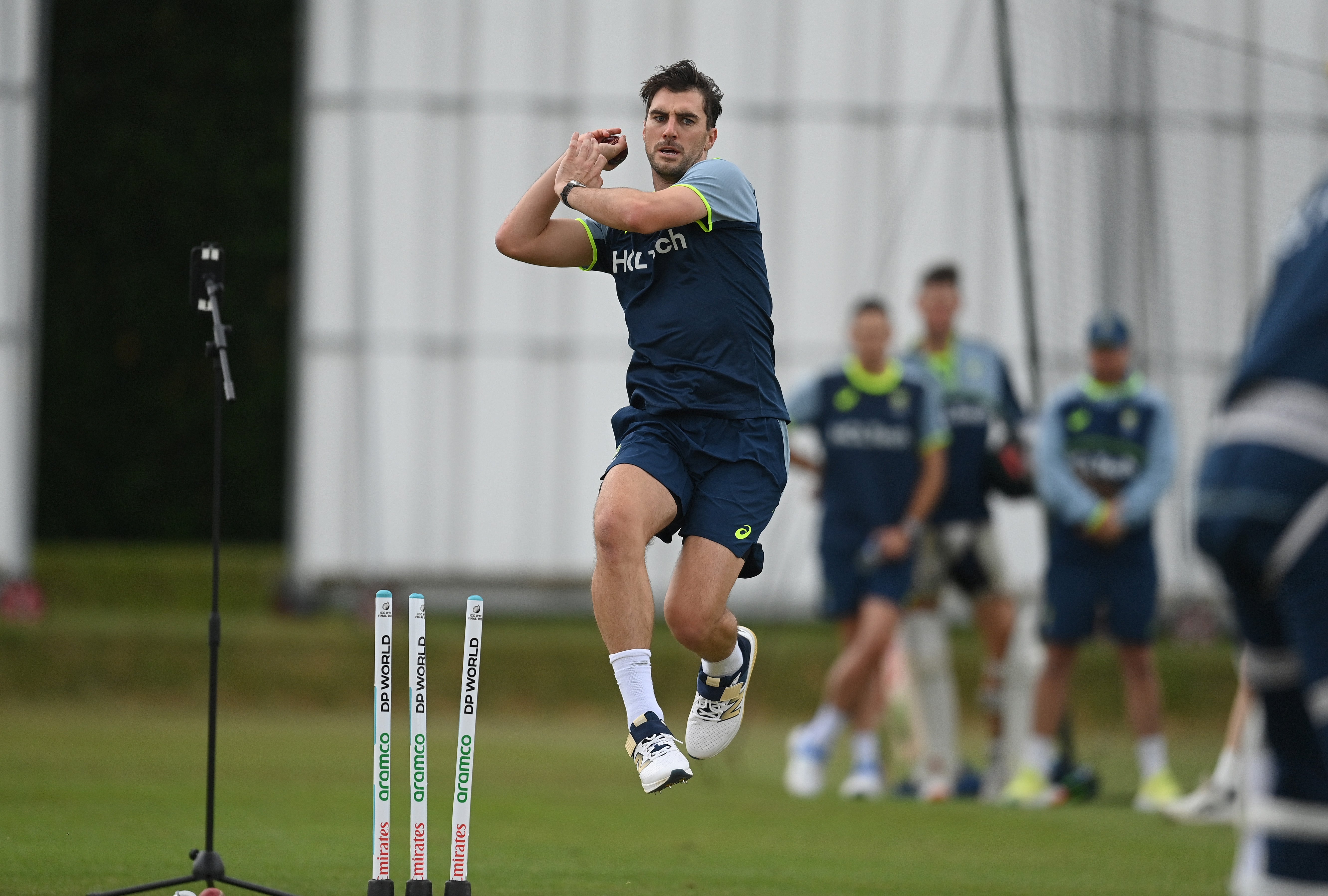 Pat Cummins of Australia bowls during a training session
