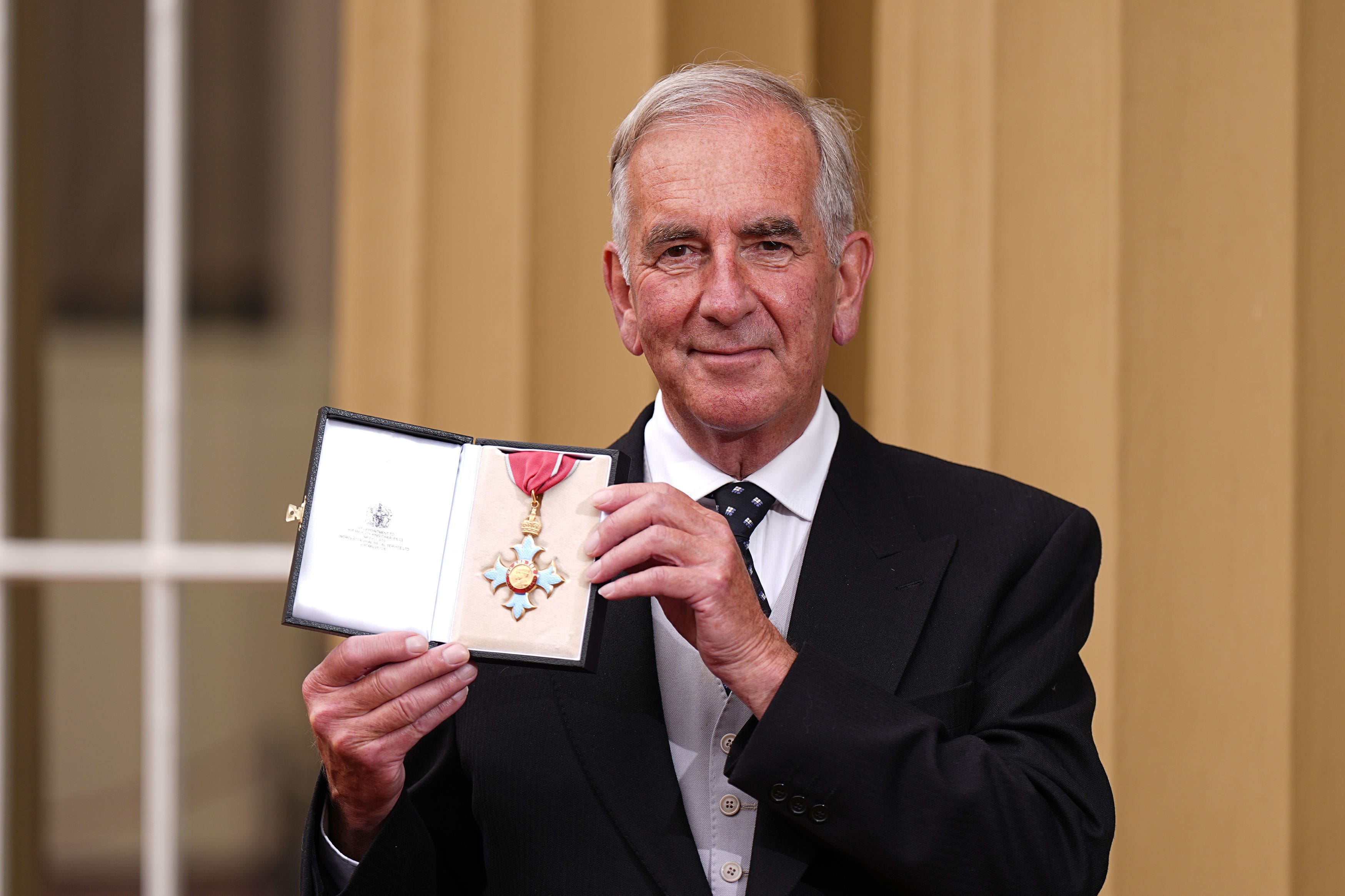 Robert Harris after receiving his CBE during an Investiture ceremony at Buckingham Palace in London (Aaron Chown/PA)