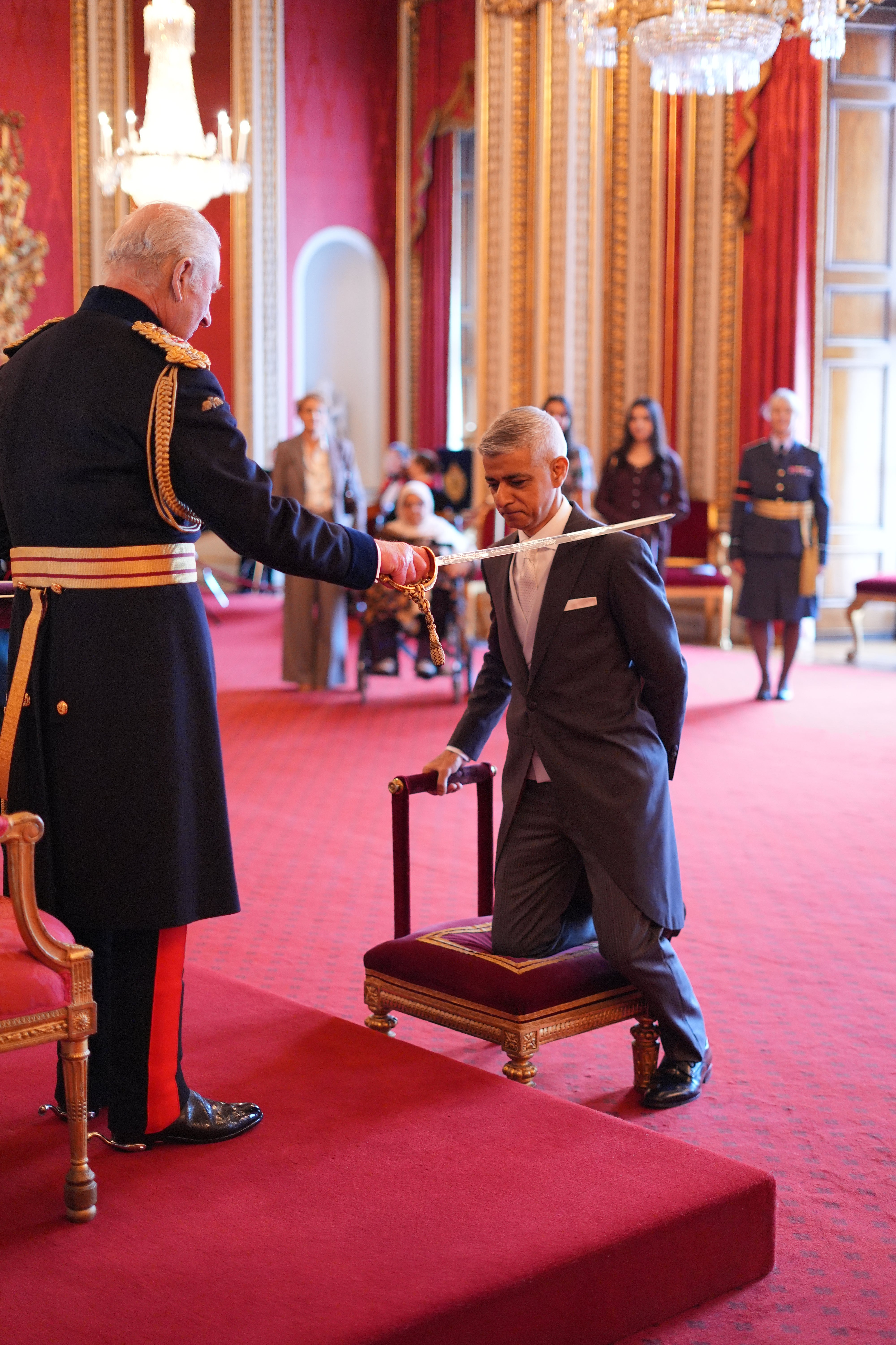 Sir Sadiq Khan is made a knight bachelor by the King at Buckingham Palace