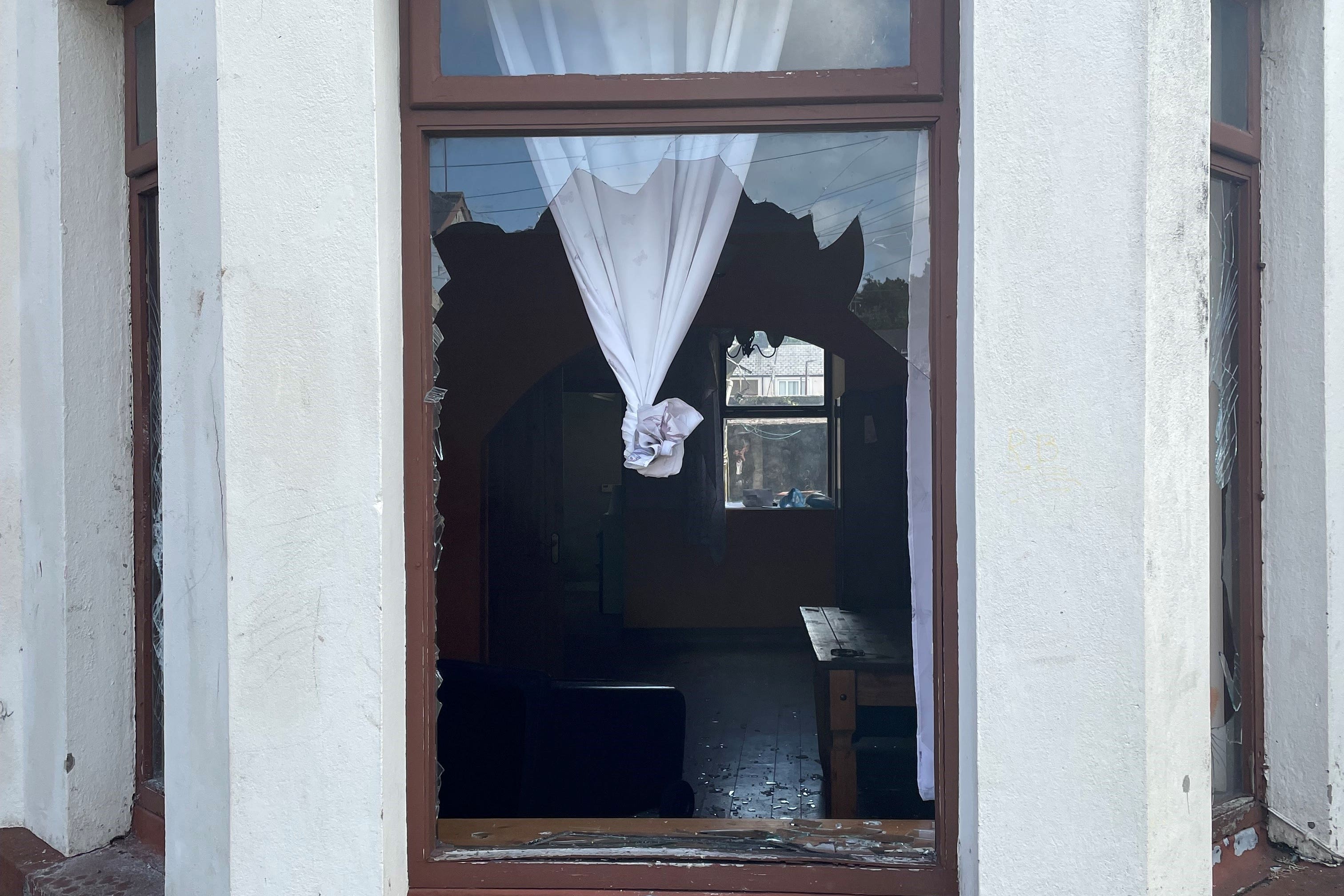 Damaged property in Clonavon Terrace, Ballymena, following the disorder in the Co Antrim town (Jonathan McCambridge/PA)