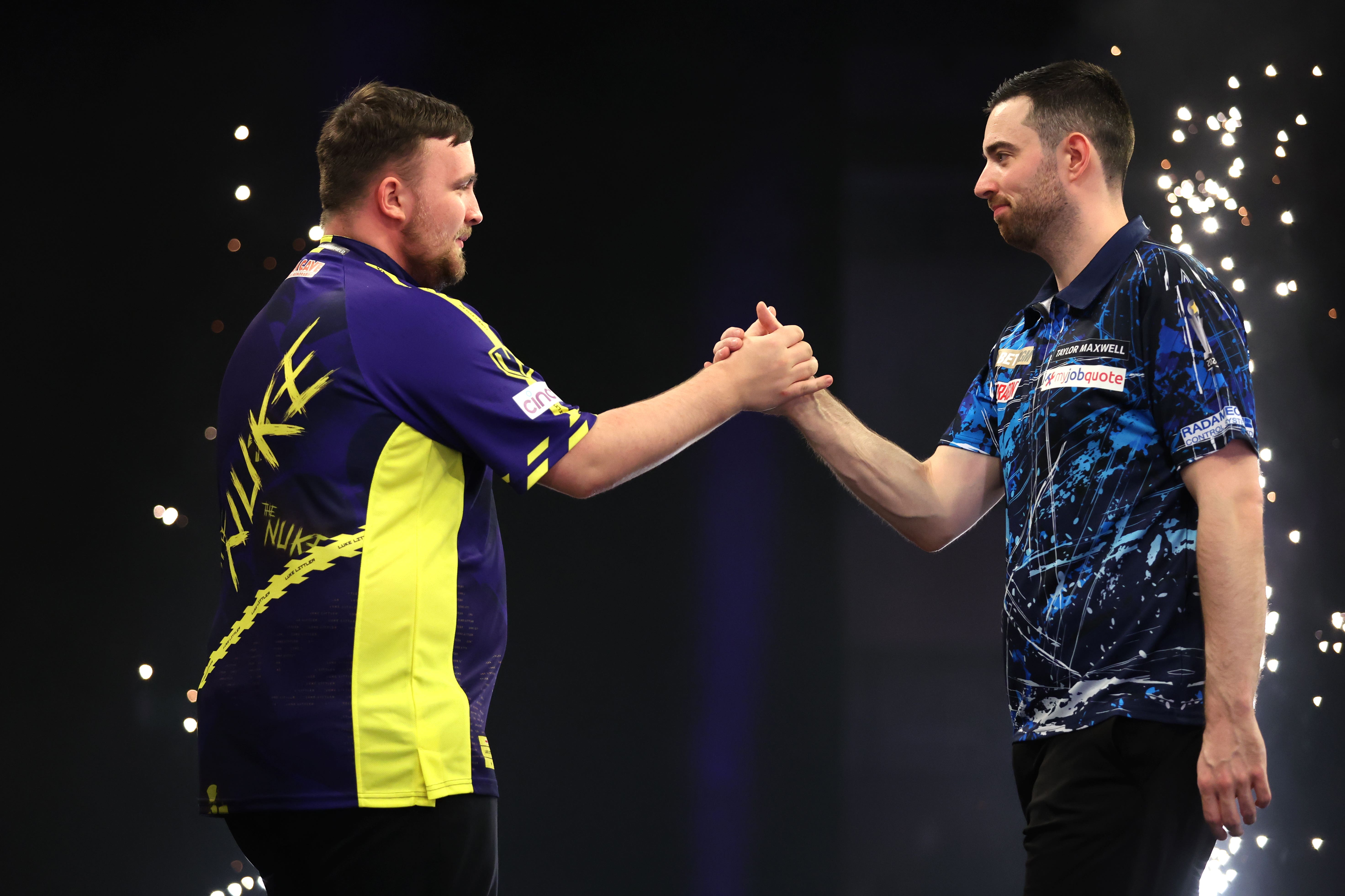Luke Littler, left, shakes hands with Luke Humphries (Nigel French/PA)