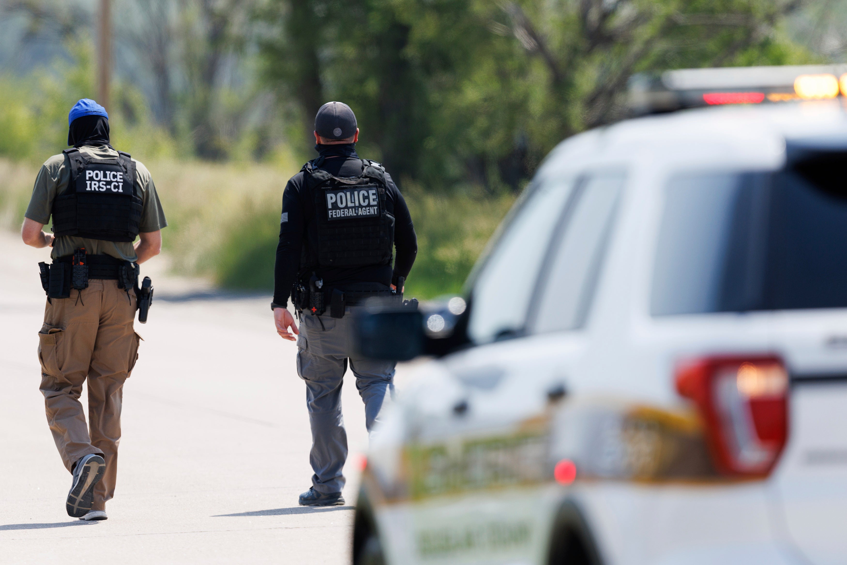Federal agents are seen near Glenn Valley Foods in Omaha