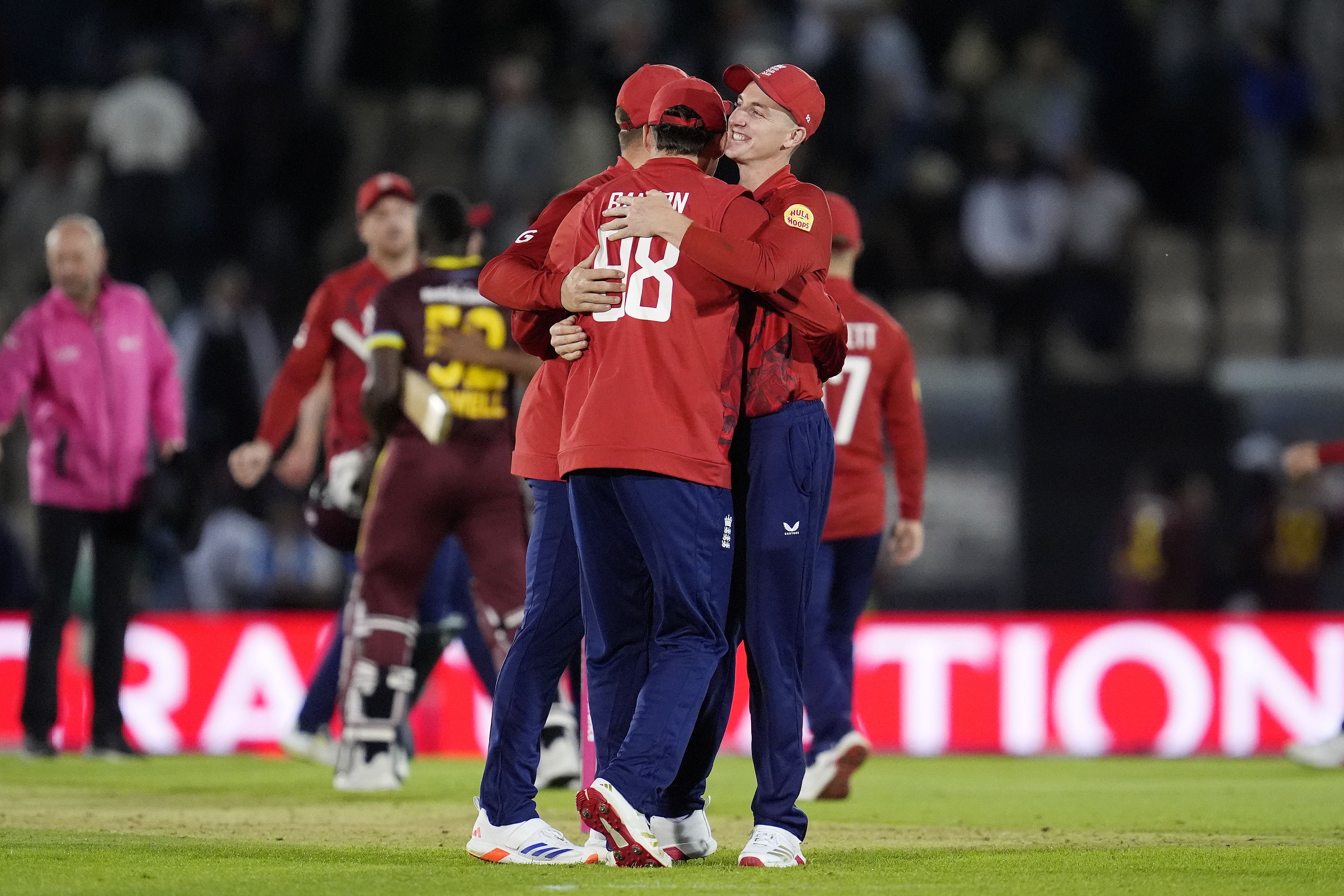 England celebrate their victory over the West Indies in the third T20 international (Andrew Matthews/PA).