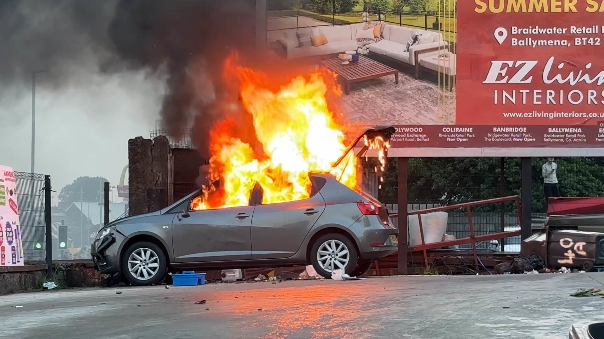 A vehicle on fire near Clonavon Terrace in Ballymena, Northern Ireland