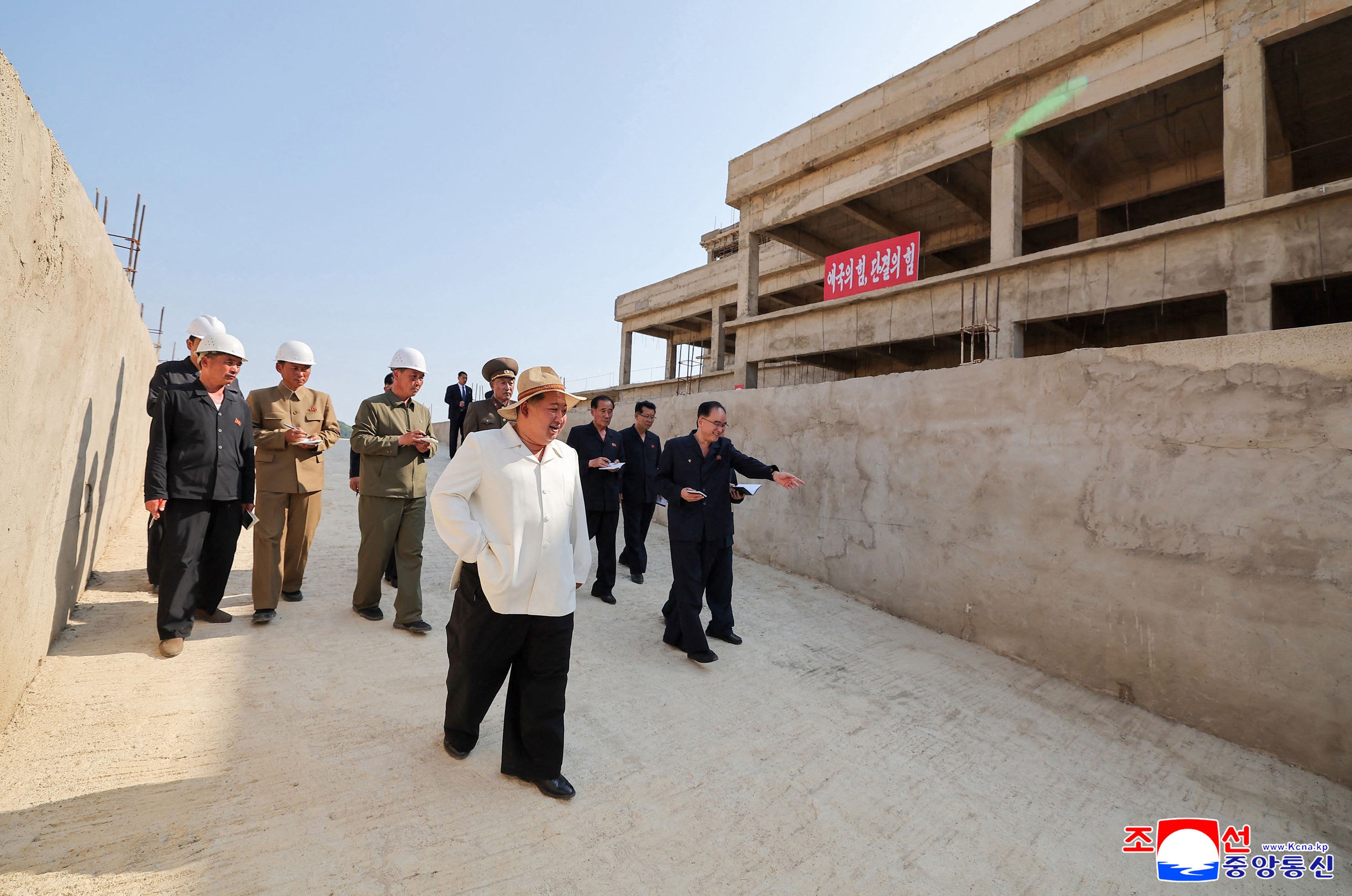 North Korean leader Kim Jong Un inspects the construction site of a new hospital in Kusong, North Pyongan