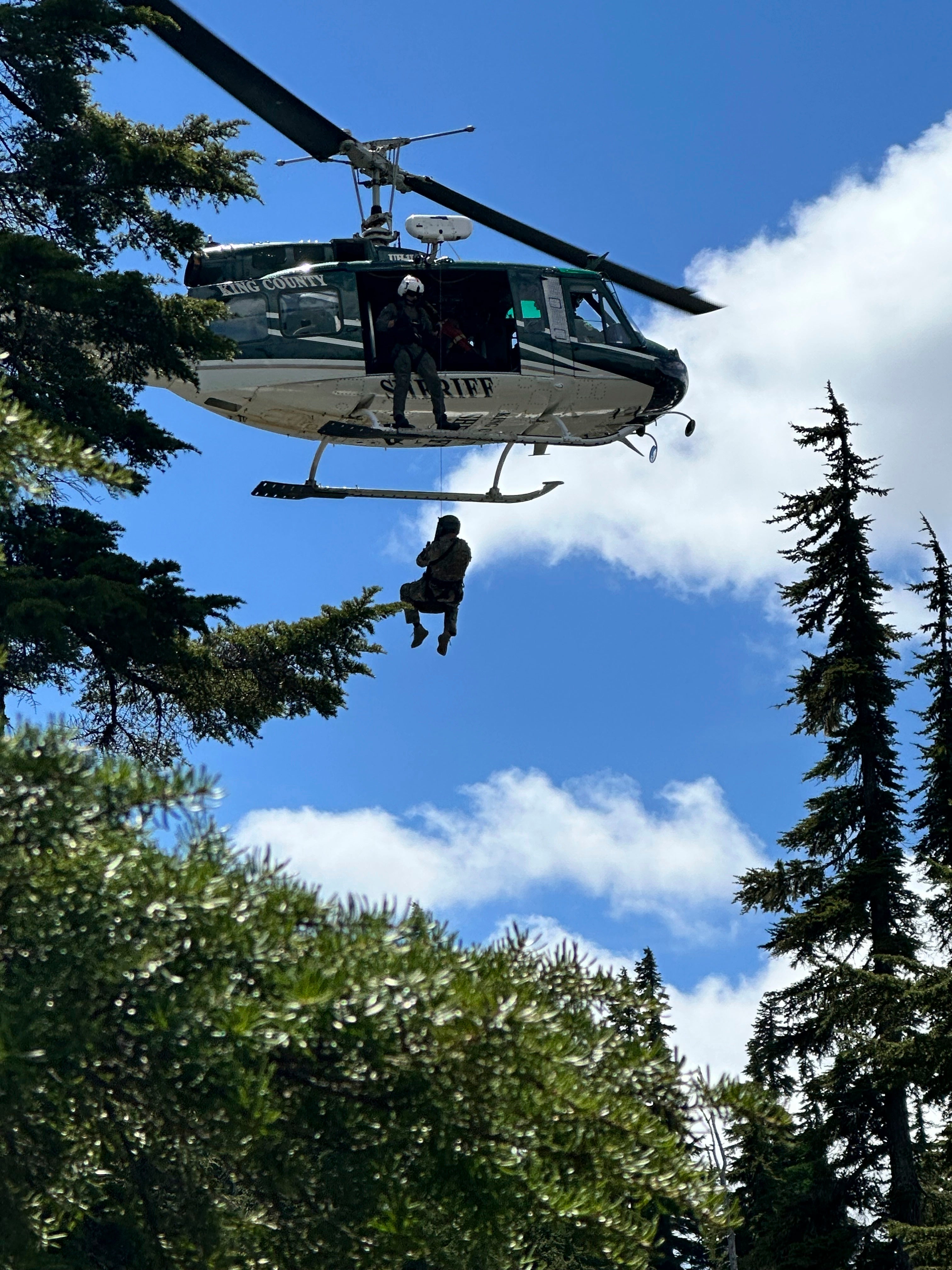 In this handout photo provided by the Snohomish County Sheriff's Office deputies participate in the search for Travis Decker, at an undisclosed location in Washington state, Friday, June 6, 2025. (Snohomish County Sheriff's Office photo via AP)