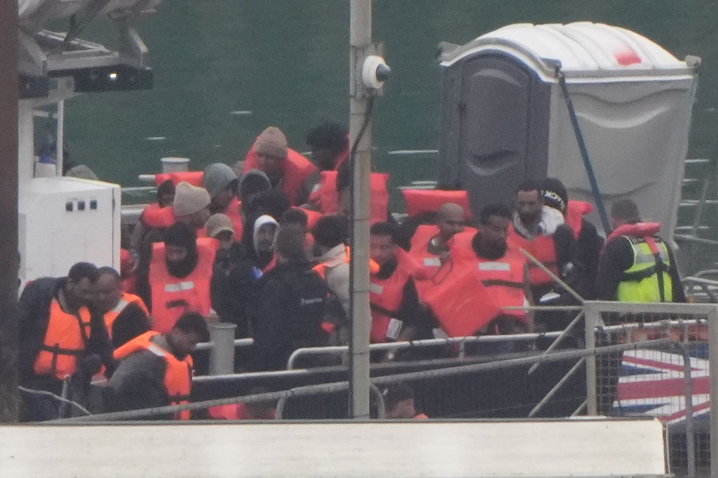 A group of people thought to be migrants are brought in to Dover, Kent, from a Border Force vessel following a small boat incident in the Channel (