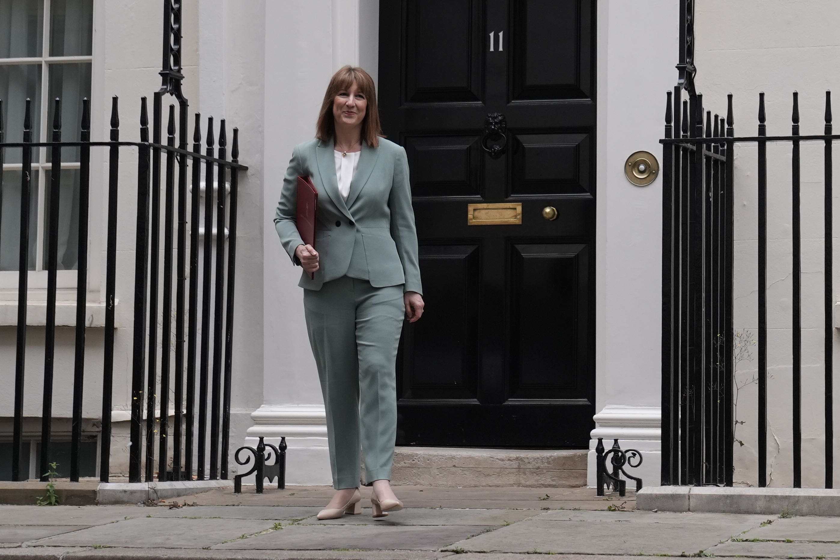 Rachel Reeves leaving 11 Downing Street before delivering her spending review in the House of Commons (Stefan Rousseau/PA)