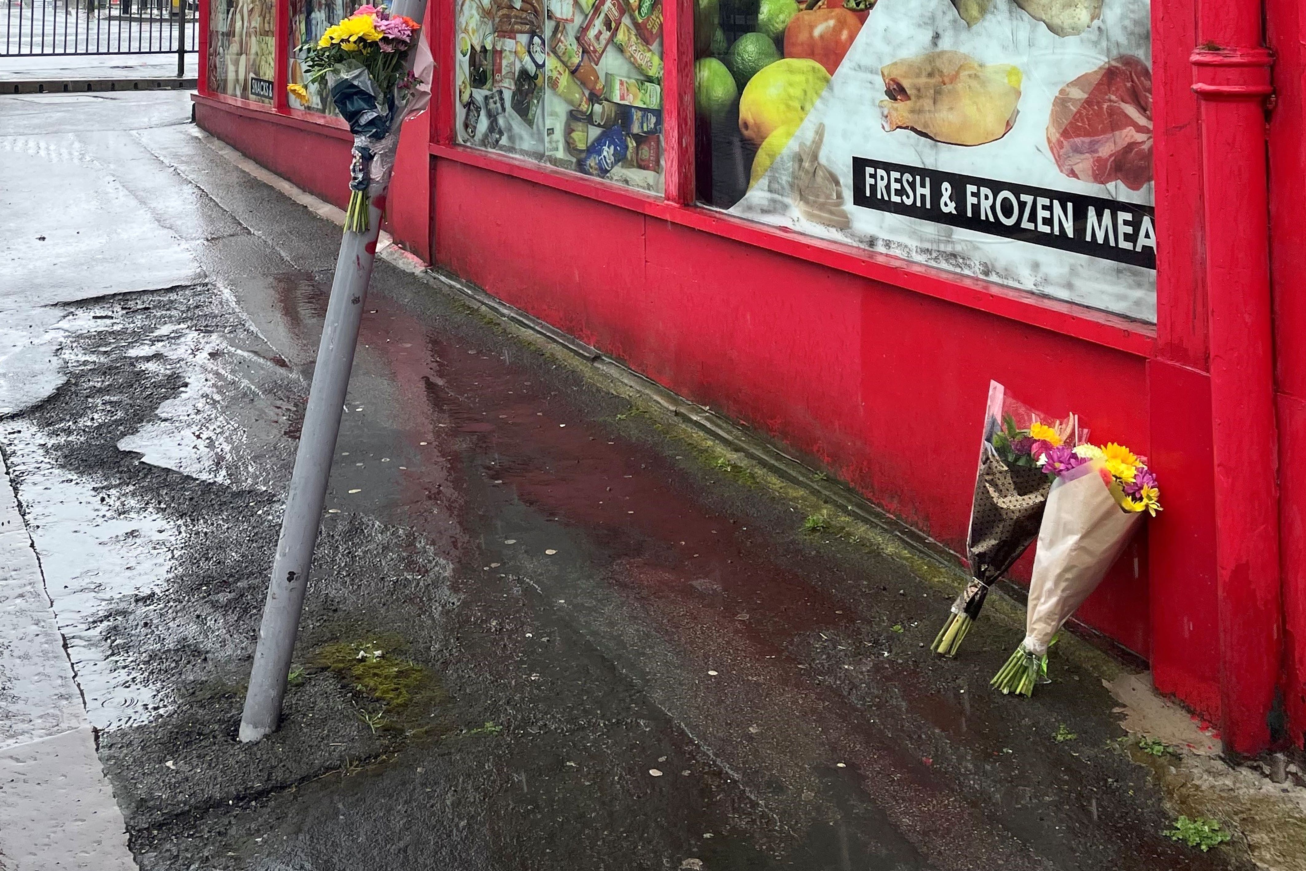 Floral tributes left in Bradford city centre after the killing (Dave Higgens/PA)