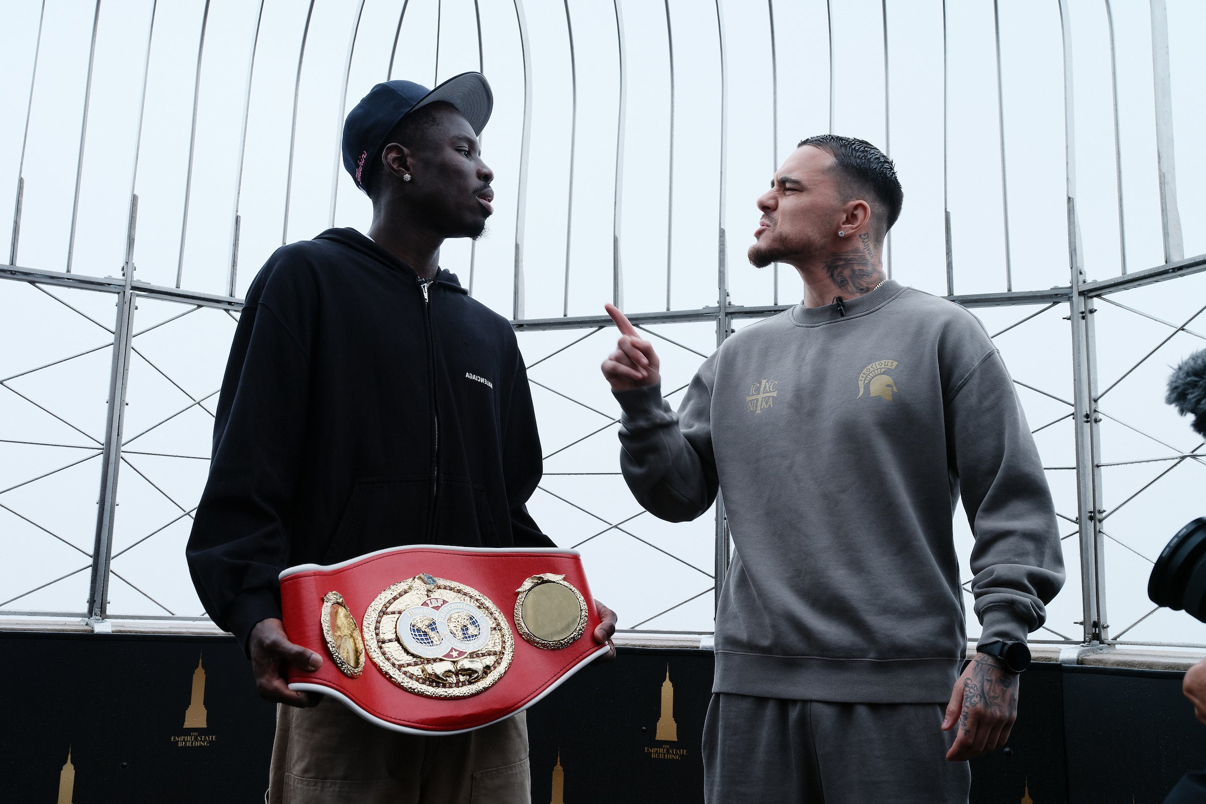 Richardson Hitchins (L) and George Kambosos Jr (R) exchange words atop the Empire State Building