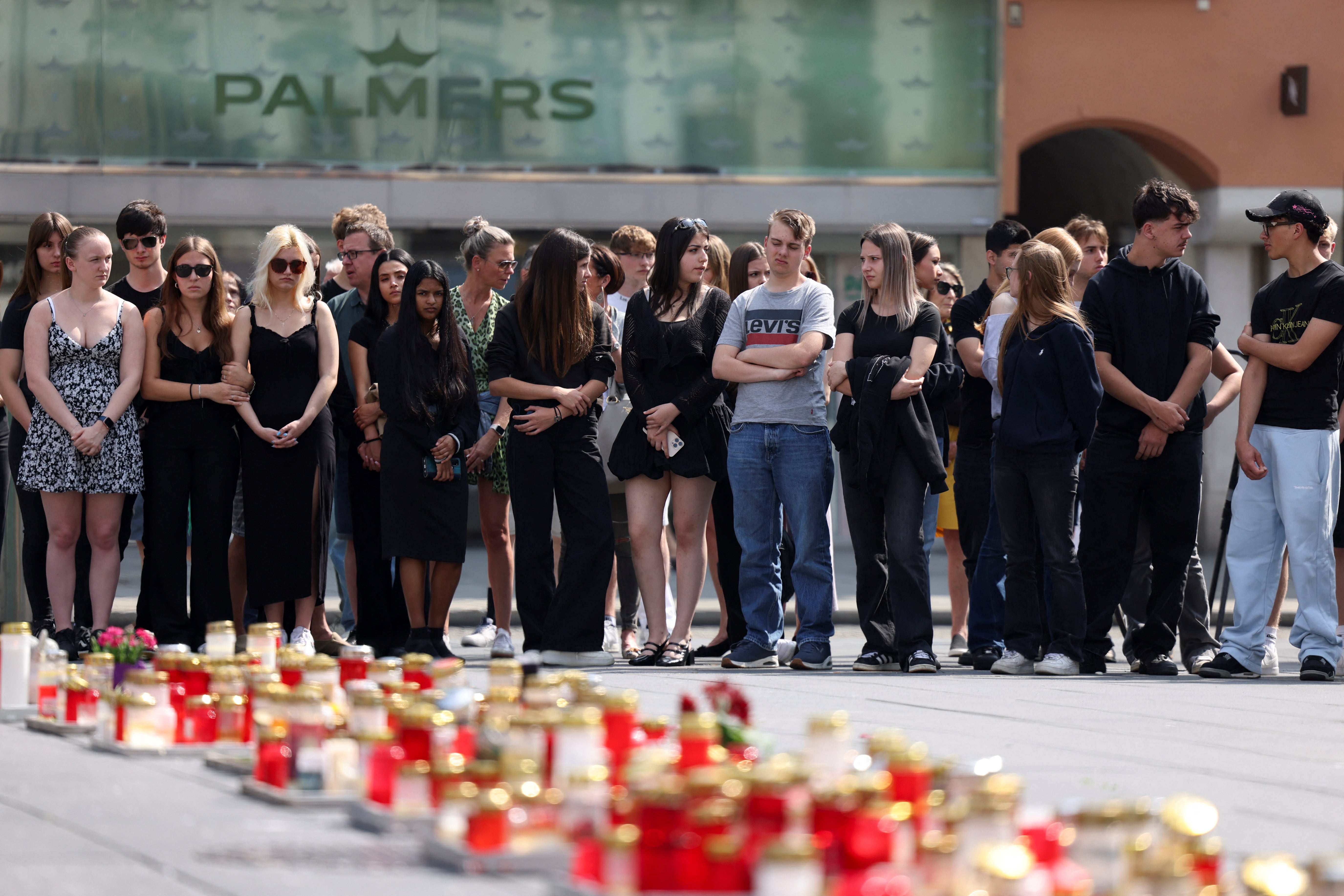A number of candles laid in memory of victims were visible in Graz’s main square