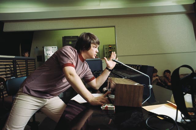 <p>A young Brian Wilson in the studio</p>