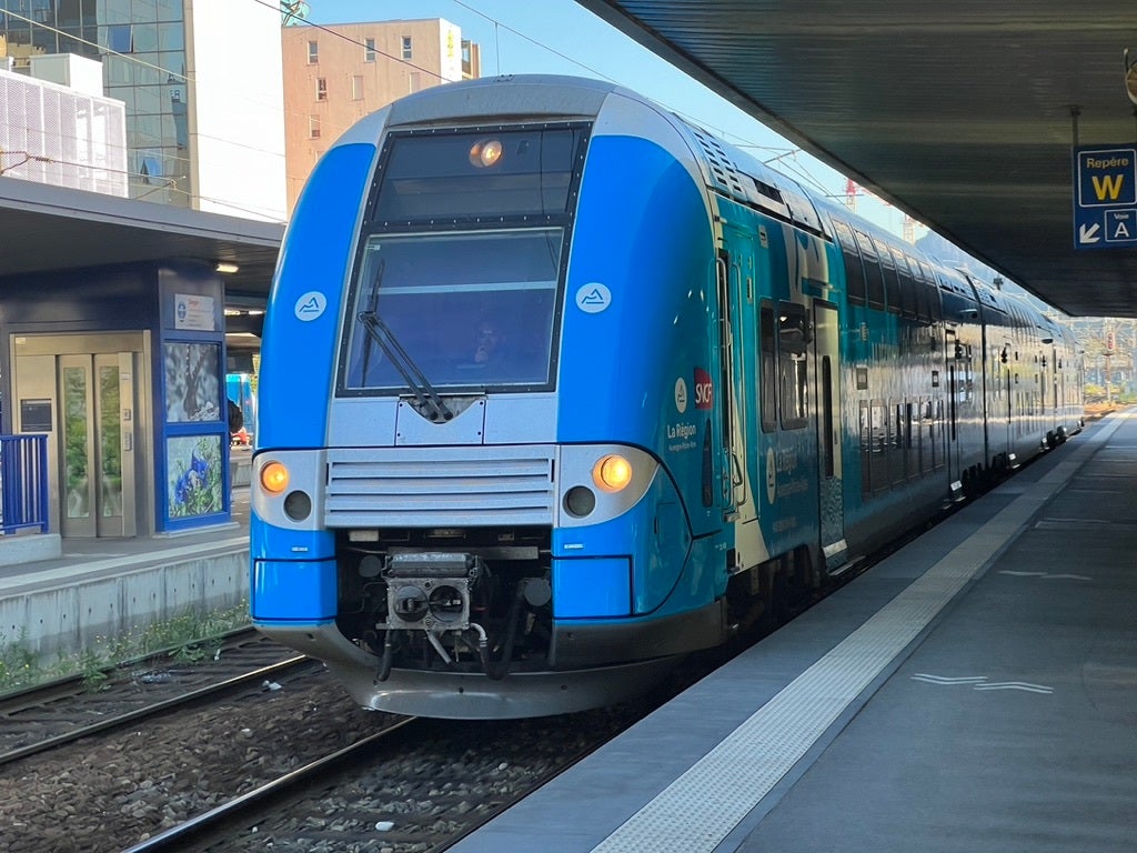 A two-storey train, a familiar sight on the continent, waits at Grenoble station in France